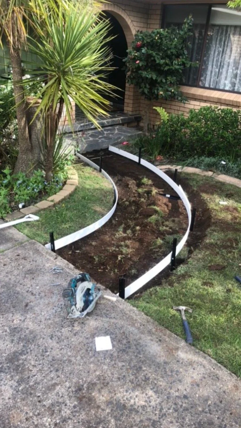 Curved pathway to entrance of house in West Bathurst NSW Regional ripped and boxed up ready to pour