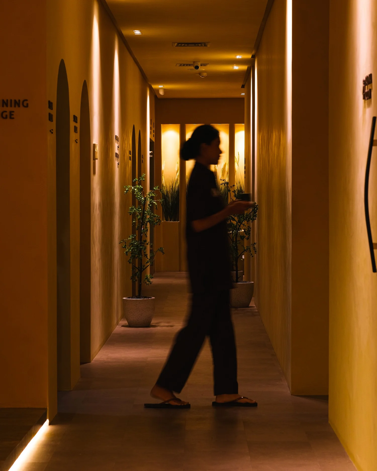 Kimaya therapist walking through the treatment hallway
