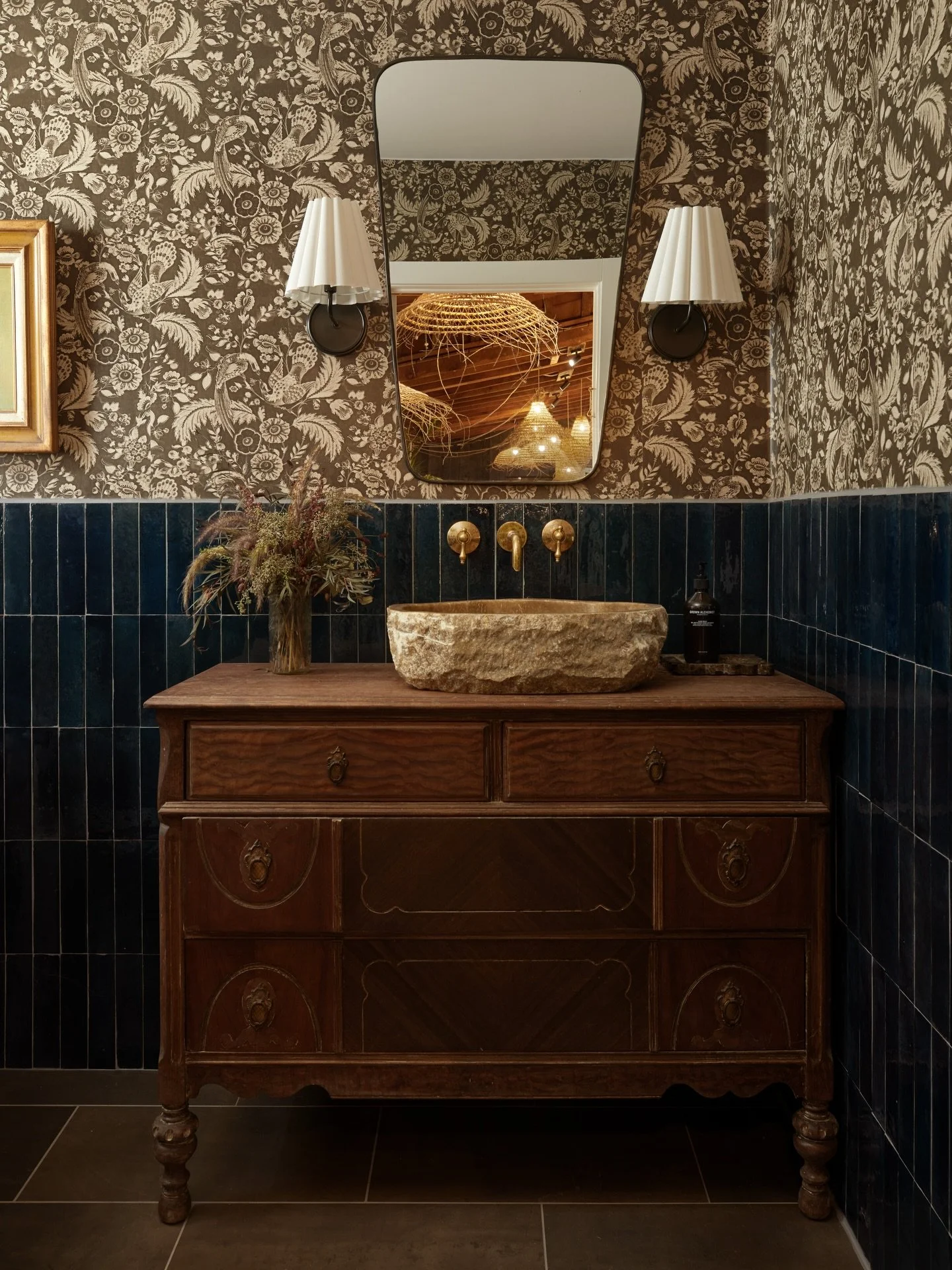A truly soulful and loved piece (that is tough to let go)..

An antique wood vanity paired with a sculptural hand-carved stone sink is storied and quietly romantic. 

Perfect for a powder room or bath that&rsquo;s meant to feel intentional, layered, 