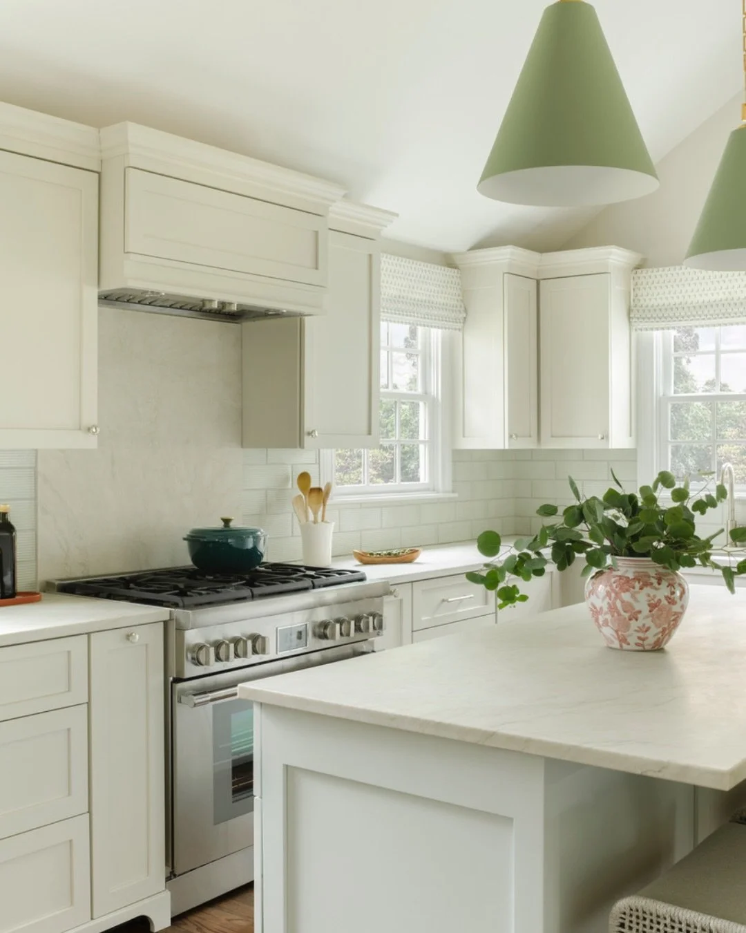 A beautiful kitchen should do more than look good; it should support the way you live. 

For these empty-nester clients (who cook a ton!), high-performance appliances, fresh materials, and thoughtful functionality were just as important as the relaxe