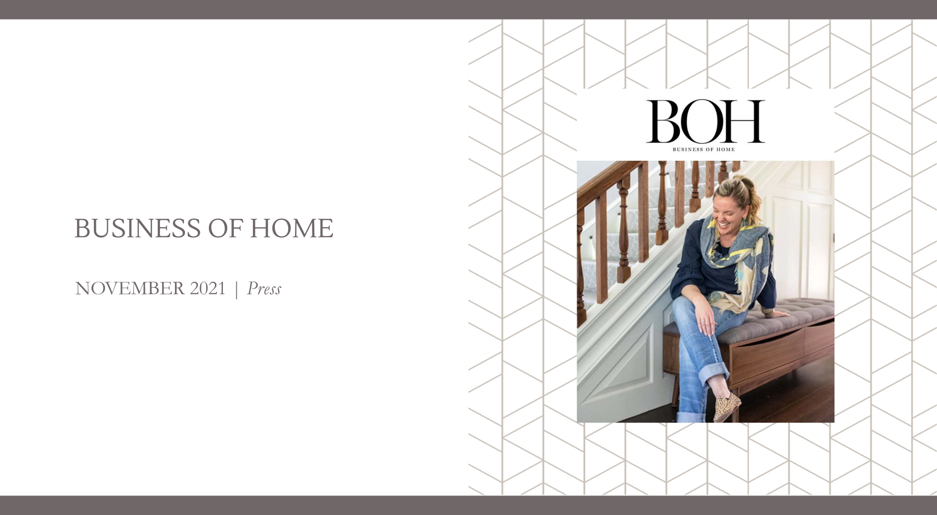 Georgia Zikas featured in Business of Home, seated on a bench beside a staircase with wood railing and paneled wall detailing.