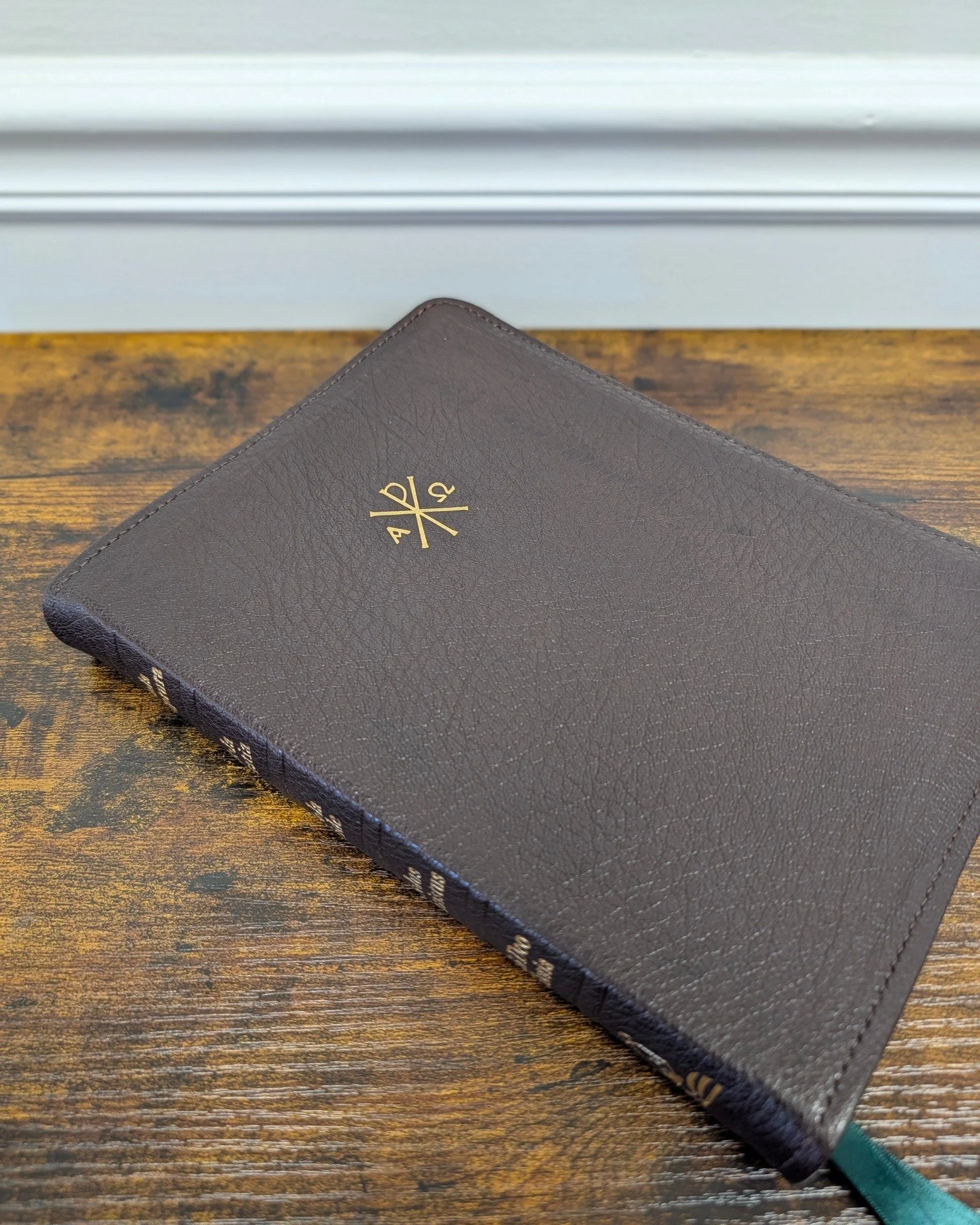 A custom rebind - mocha Levant goatskin. Awesome graining on this one!