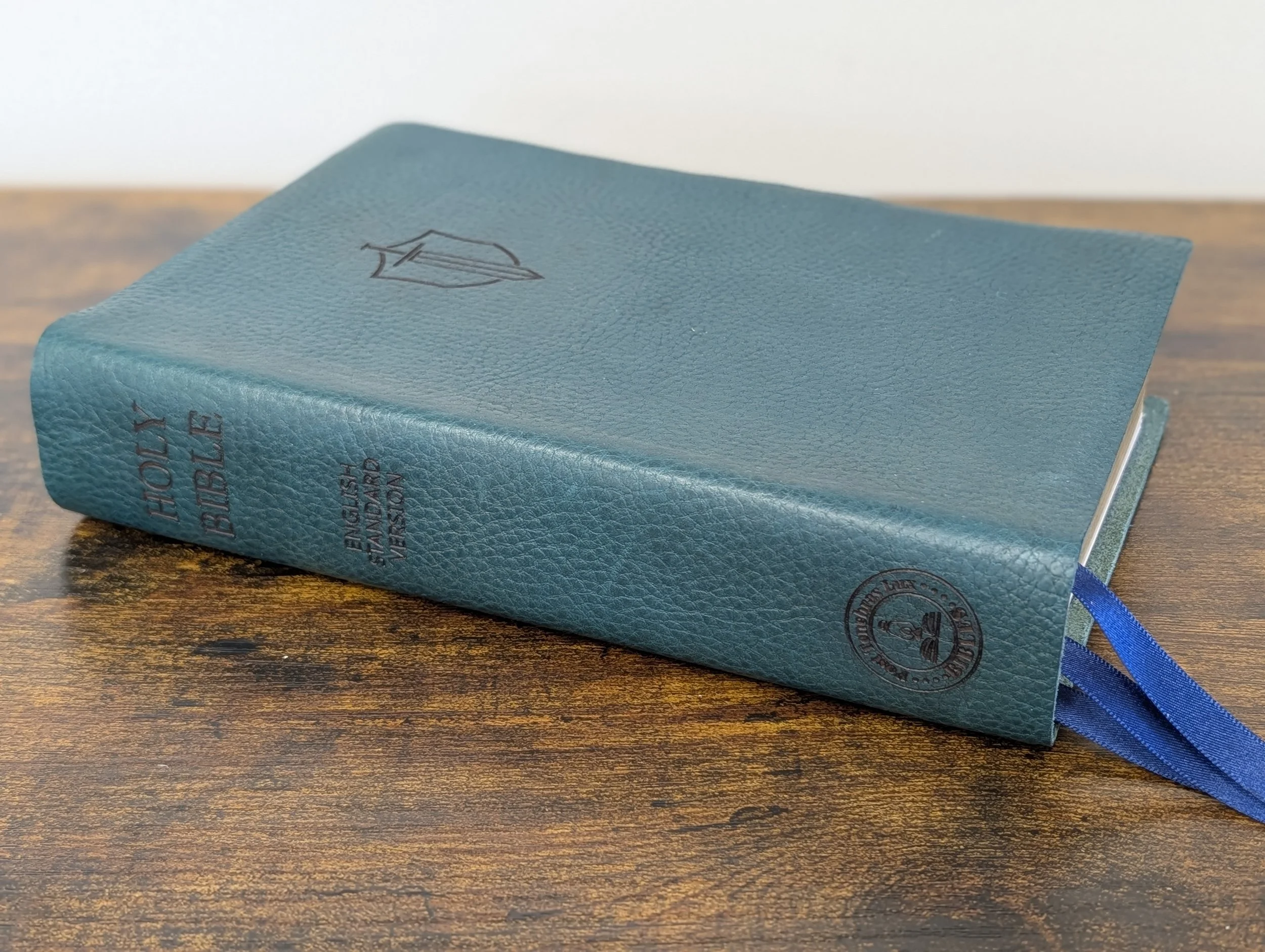 Turquoise with basic spine and sword and shield engraving