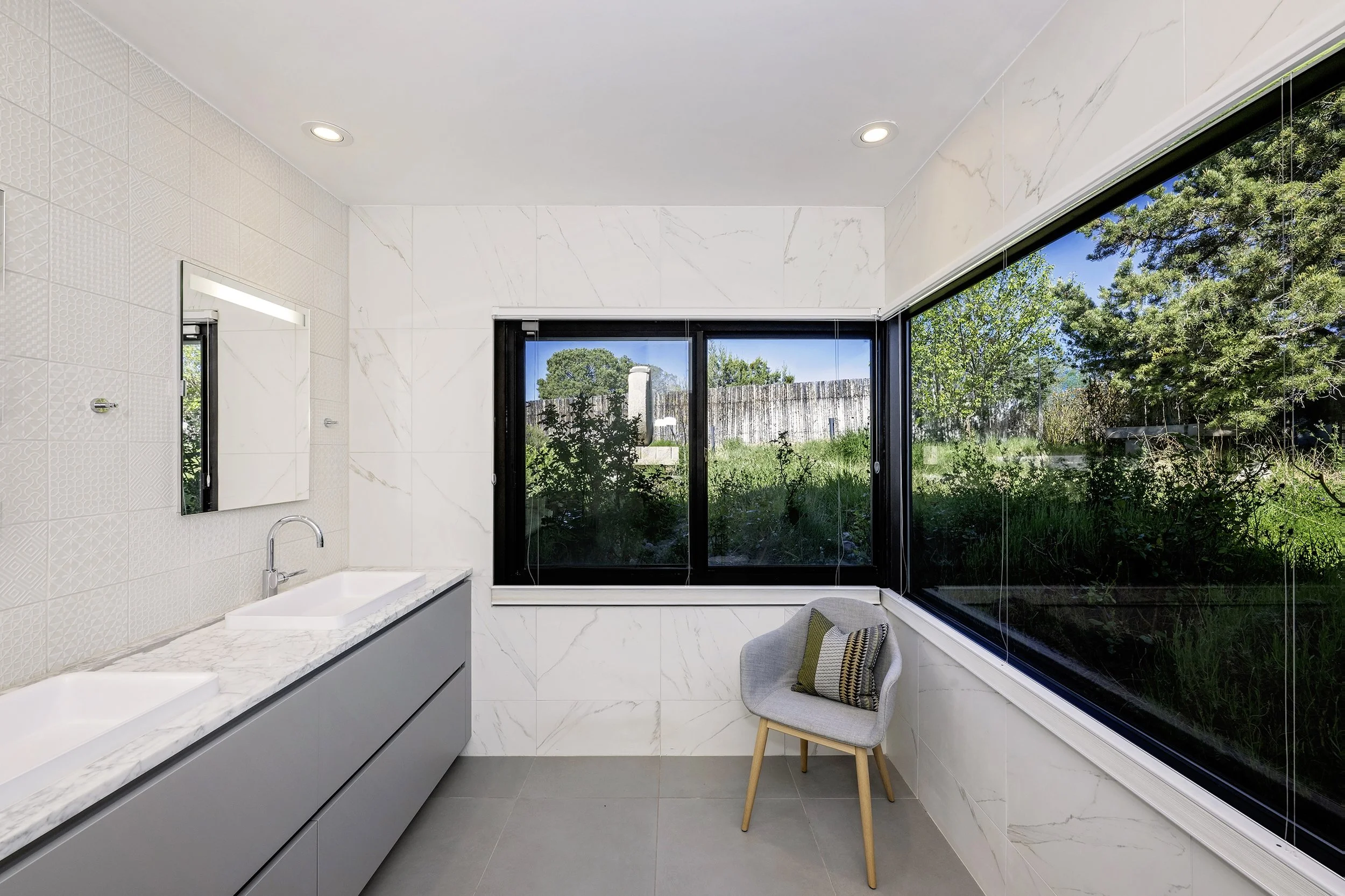 Master bath of contemporary house in Santa Fe with amazing exterior view