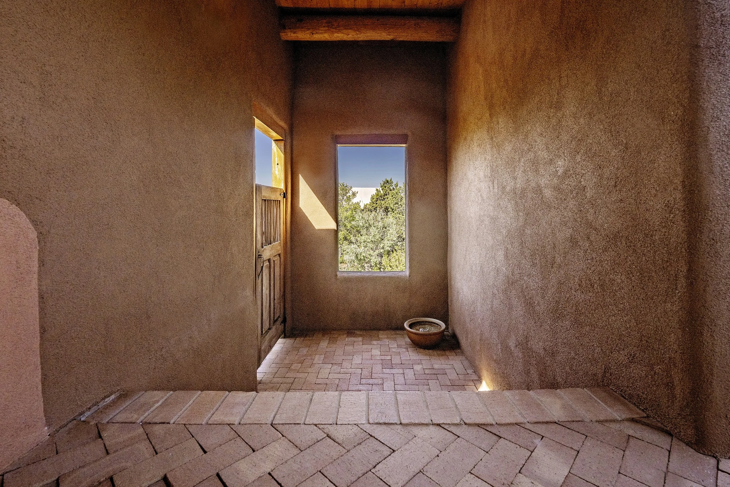 Quiet exterior portal at Eastside Santa Fe house