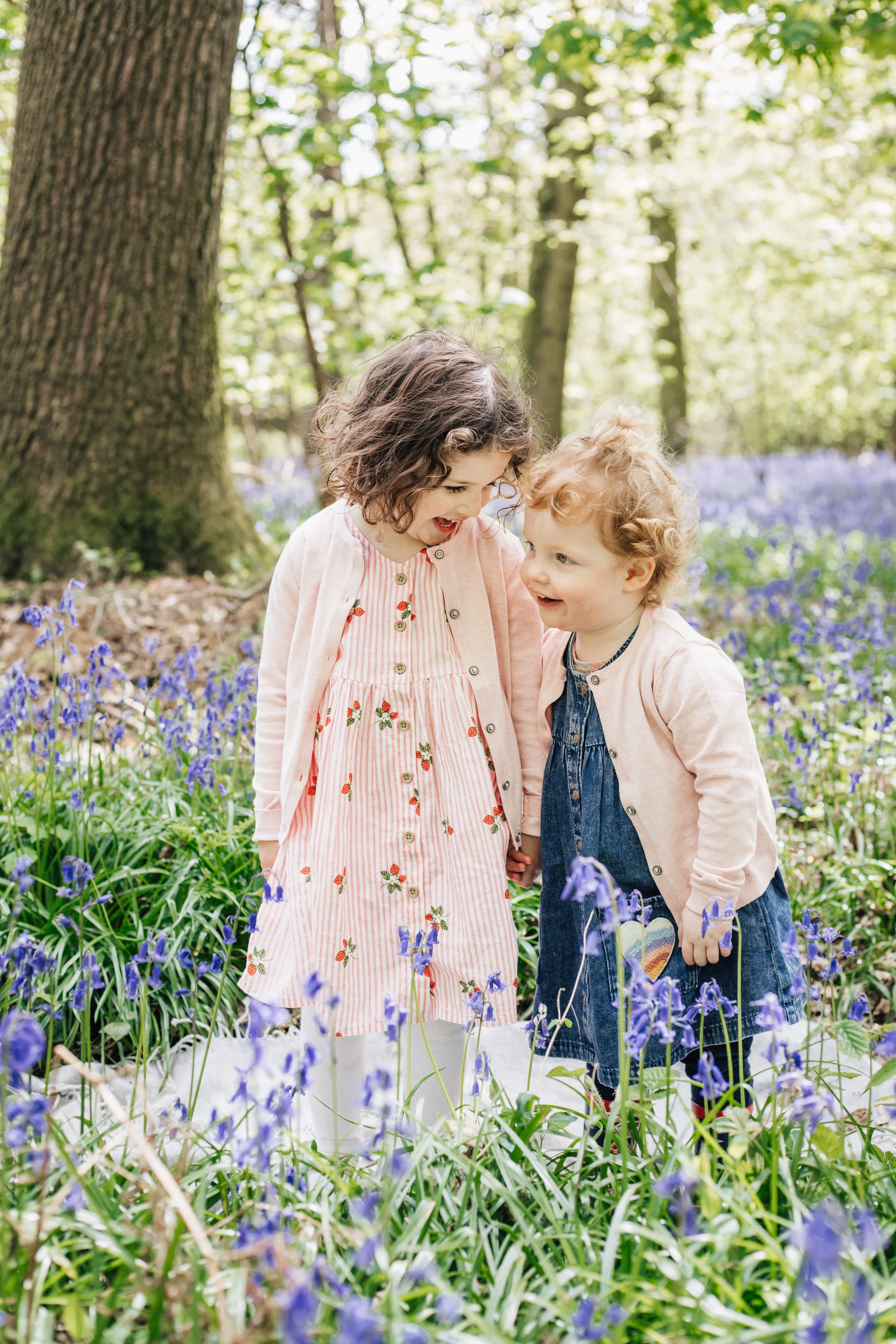 Two Girls  in bluebell woods, west berkshire uk, family photography, bluebell photography, Parker-Wilson Photography