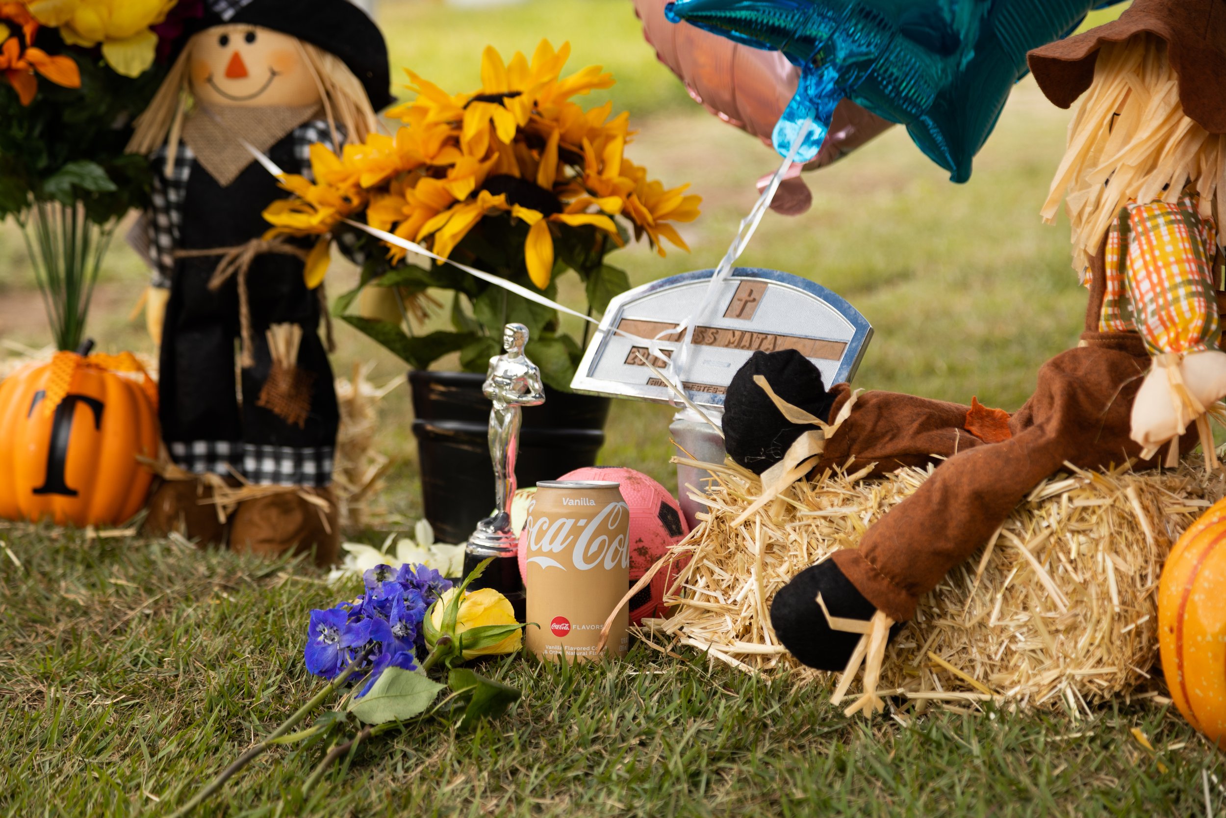  Jerry Mata leaves a vanilla Coca-Cola drink at the head of his daughter's grave in the Hillcrest Memorial Cemetery in Uvalde on Nov. 2, 2022. Mata said that his daughter, Tess, loved the drink during her life. 
