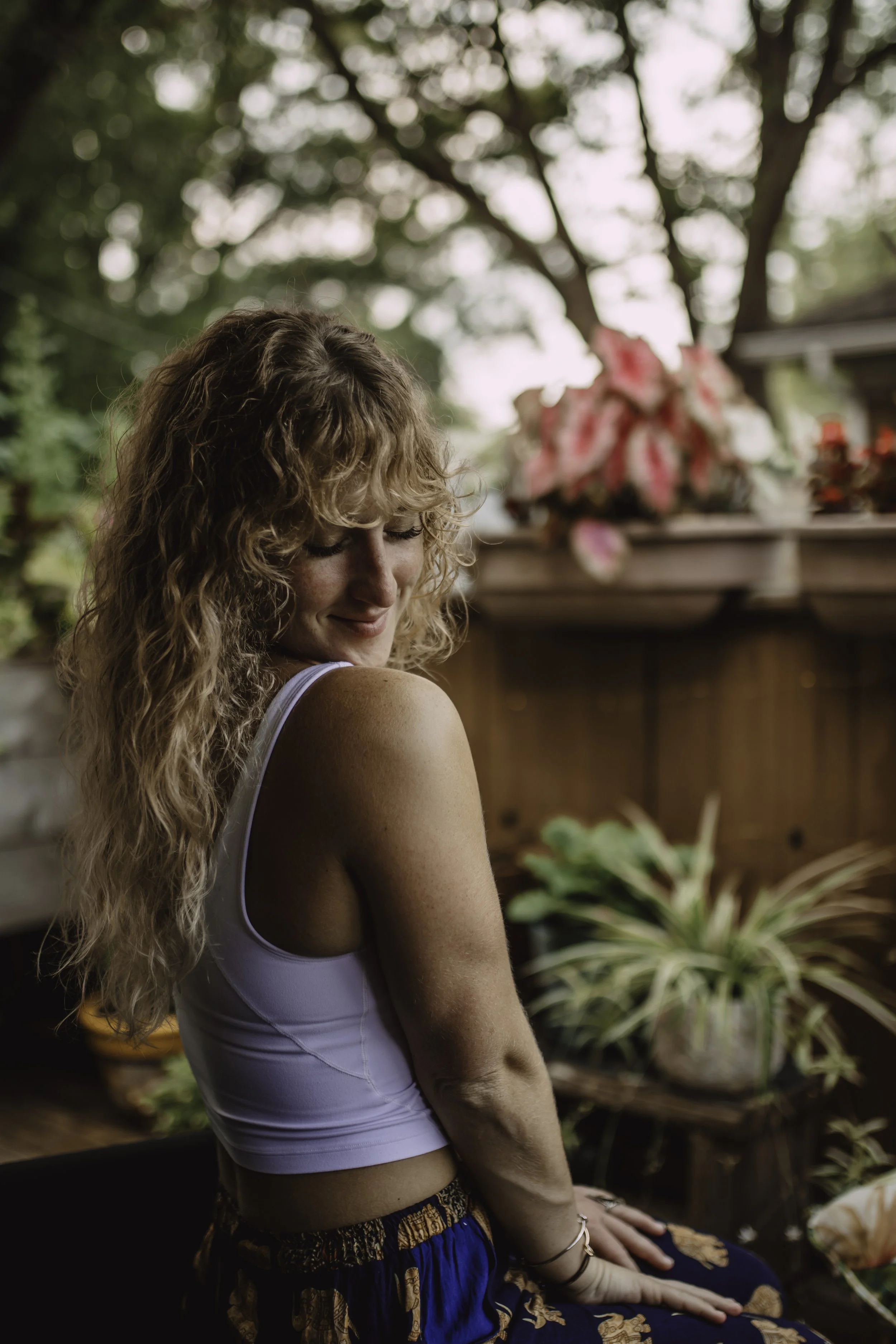 Lived-in Beachy Dimensional Blonde & Signature All Natural Haircut embracing & enhancing her hand-styled, natural curly hair. Proving you can look SEXY AF with curly bangs too!! 
Photo by t.e.+co