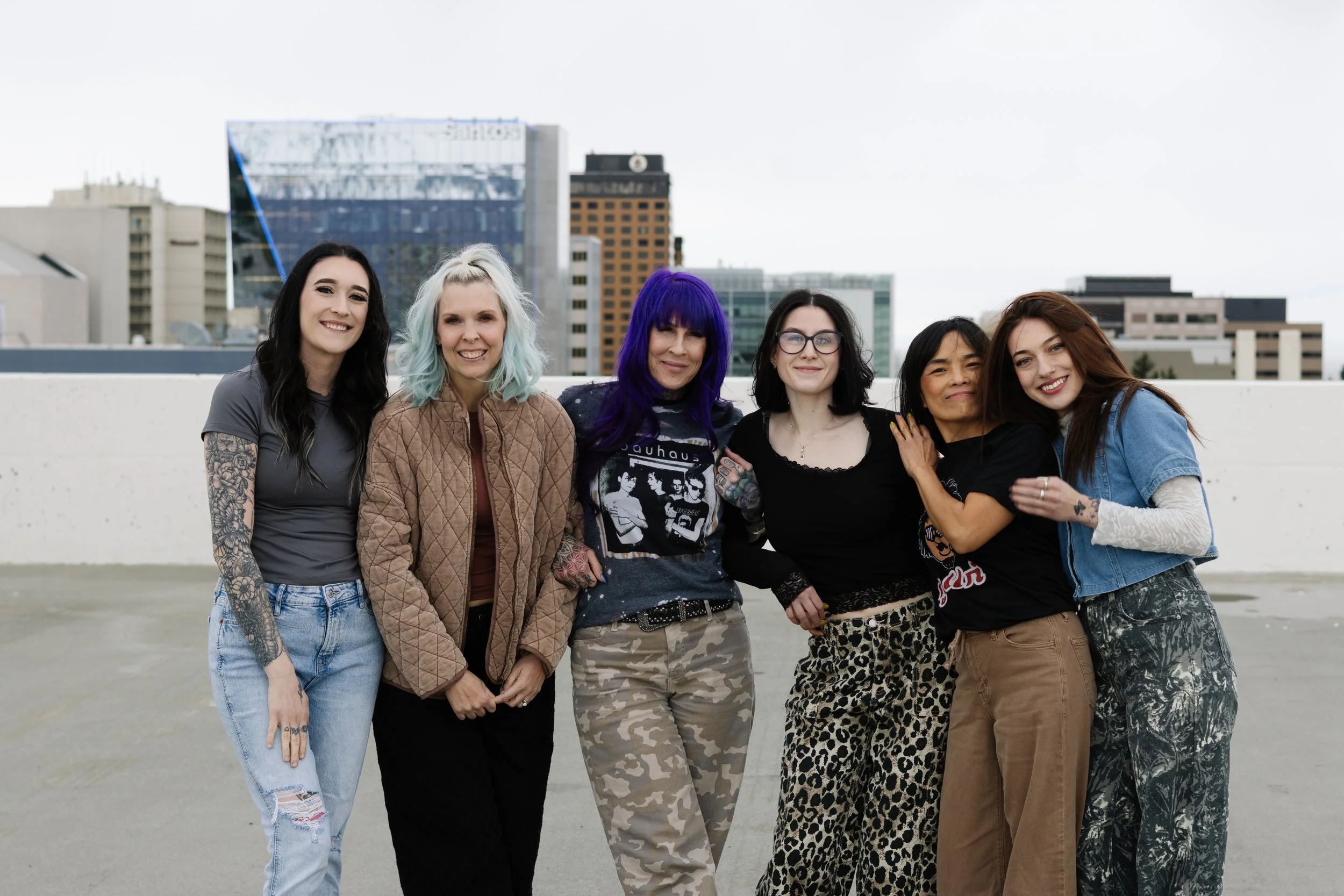 Anchorage Salon Stylist from Misfits Salon standing together in a group,