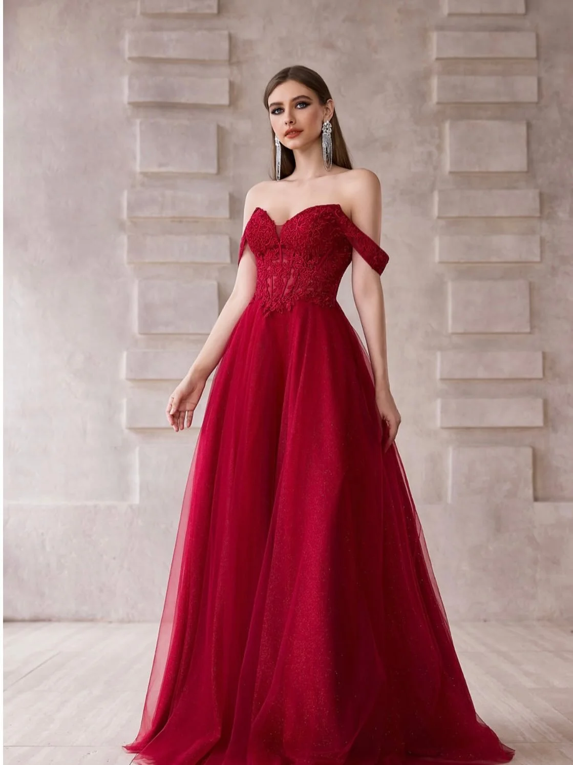 Imagine entering your prom in this gorgeous deep red gown with shoulder sleeves. By J&rsquo;Adore Evening, size 16. #promdresses #offtherackpromdresses #prom2026 #redpromdresses #breezyboutiqueco