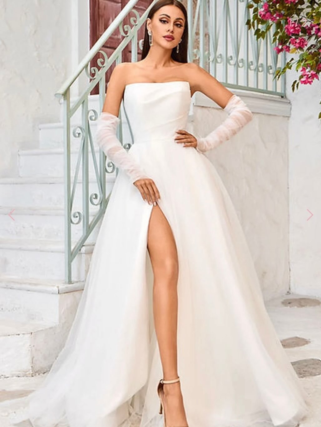 NOW ONLY $399! This gorgeous strapless tulle gown is one of the dresses in our off-the-rack clear out sale. Bridal size 12.
