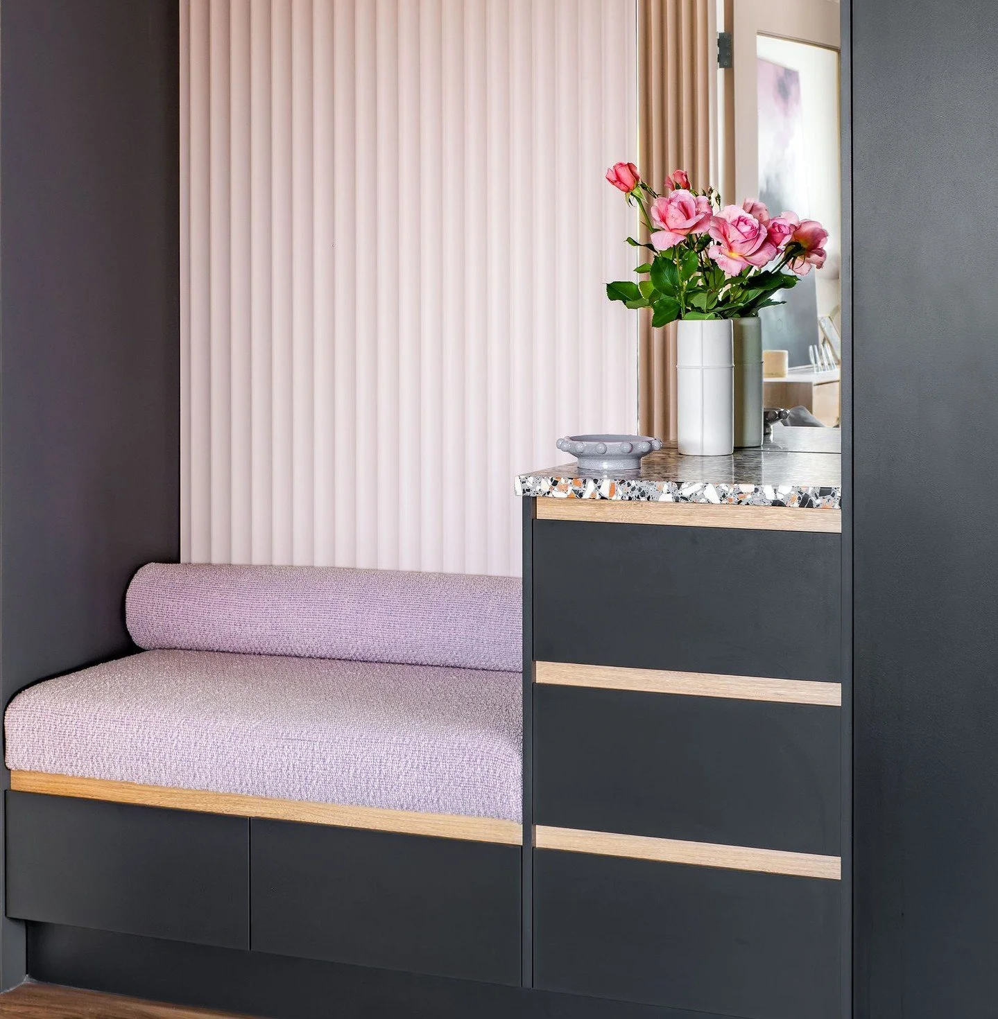 Every home needs a statement entry with storage, seating, a mirror and something gorgeous. Our clients love the colour purple and this boucle cushion and bolster pairs so well with the left over terrazzo slab we salvaged and reused. Perfectly execute