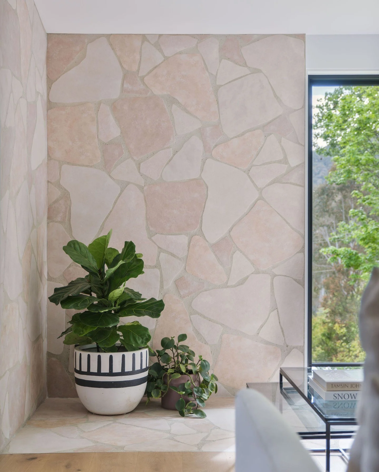 Do you think this wall lining is just for looks? Nope, she's primed for a new firebox to sit pretty in front and we were tight on space, so we lined the wall with this @tilecloud crazy paving tile. Dutifully awaiting the winter for the fire to be ins