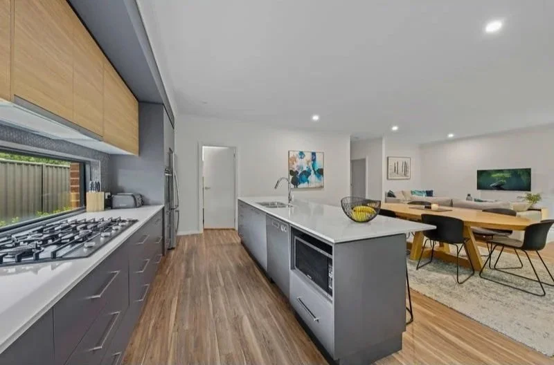 BEFORE: Kitchen, dining, living and the location of the future coffee bar