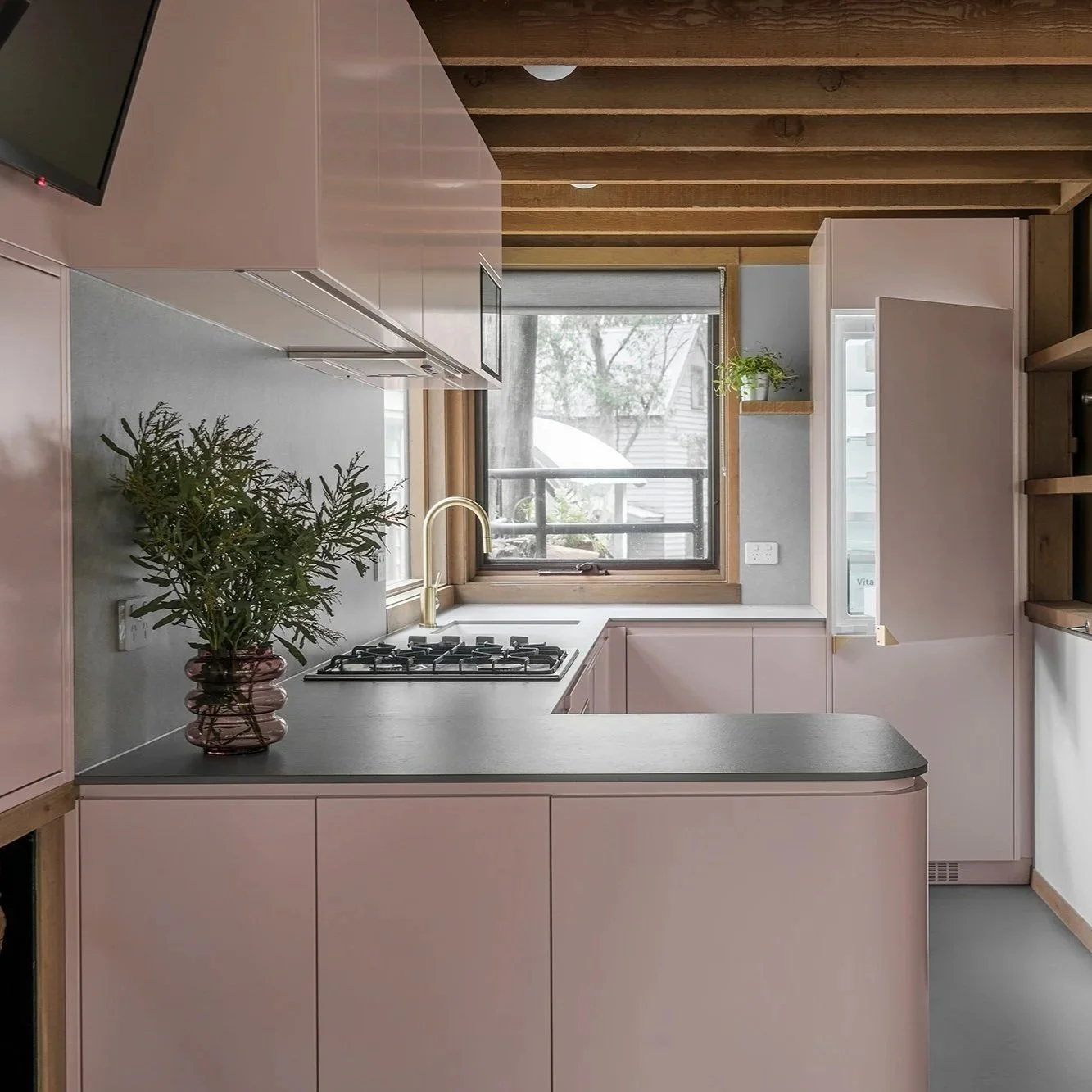 Blairs Chalet kitchen features a unique materials palette