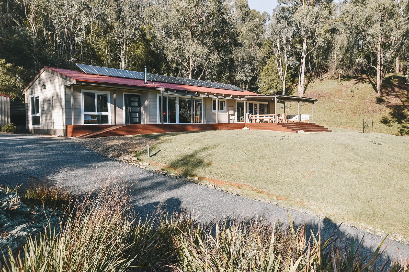 Alpine Gum holiday home nestled among native gum trees on a hillside overlooking Bright in Victoria's High Country.