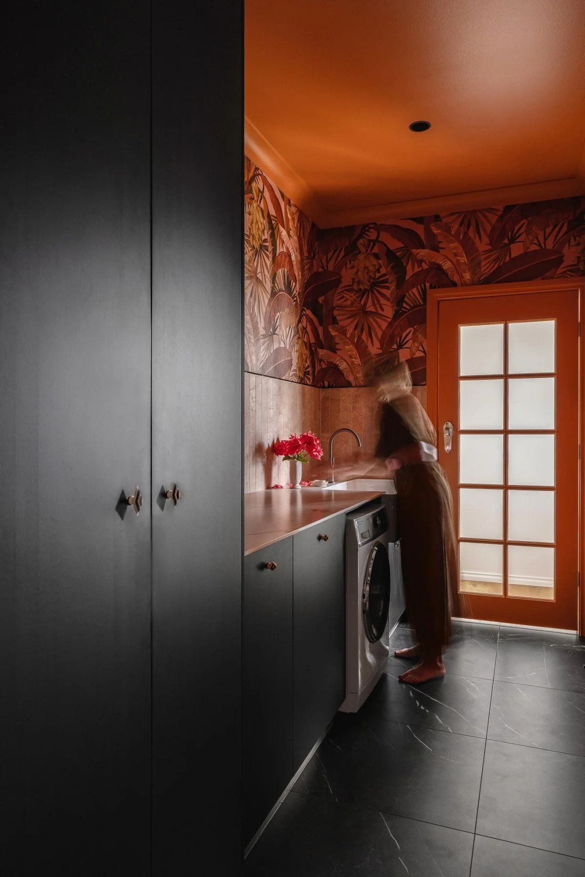 At the rear of the home, the laundry and adjoining powder room form the crescendo of the journey. They are also Britt’s absolute favourite spaces in the house.
