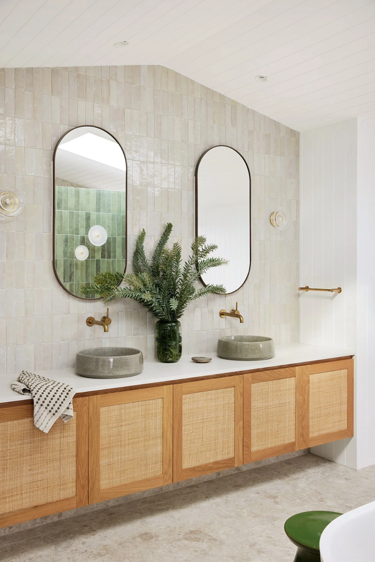 Double vanities and custom joinery provide a spacious feel for the ensuite of High Tide