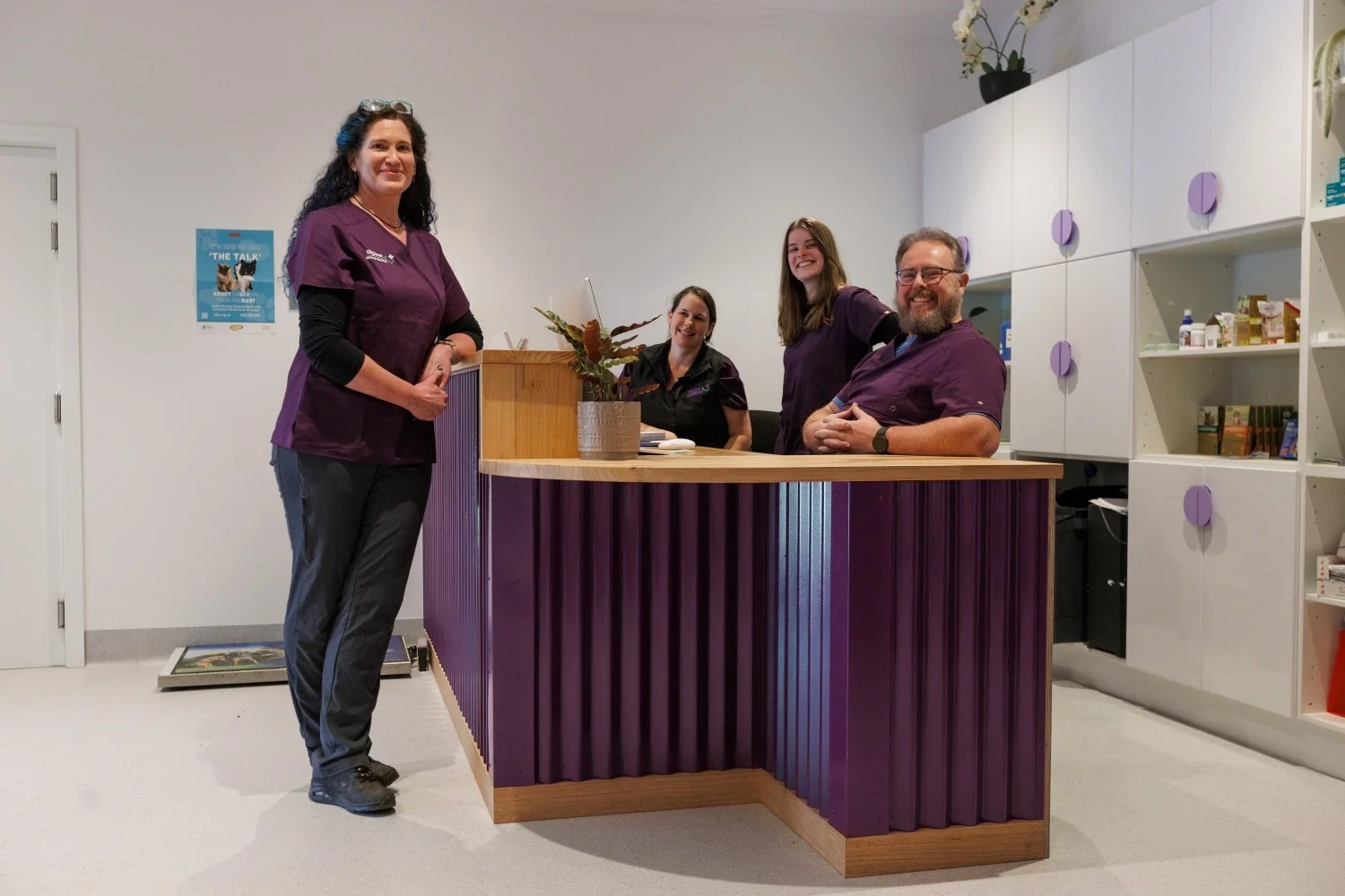 Dr Bek, mark and employees at Alpine Animal Doctors in their new reception area