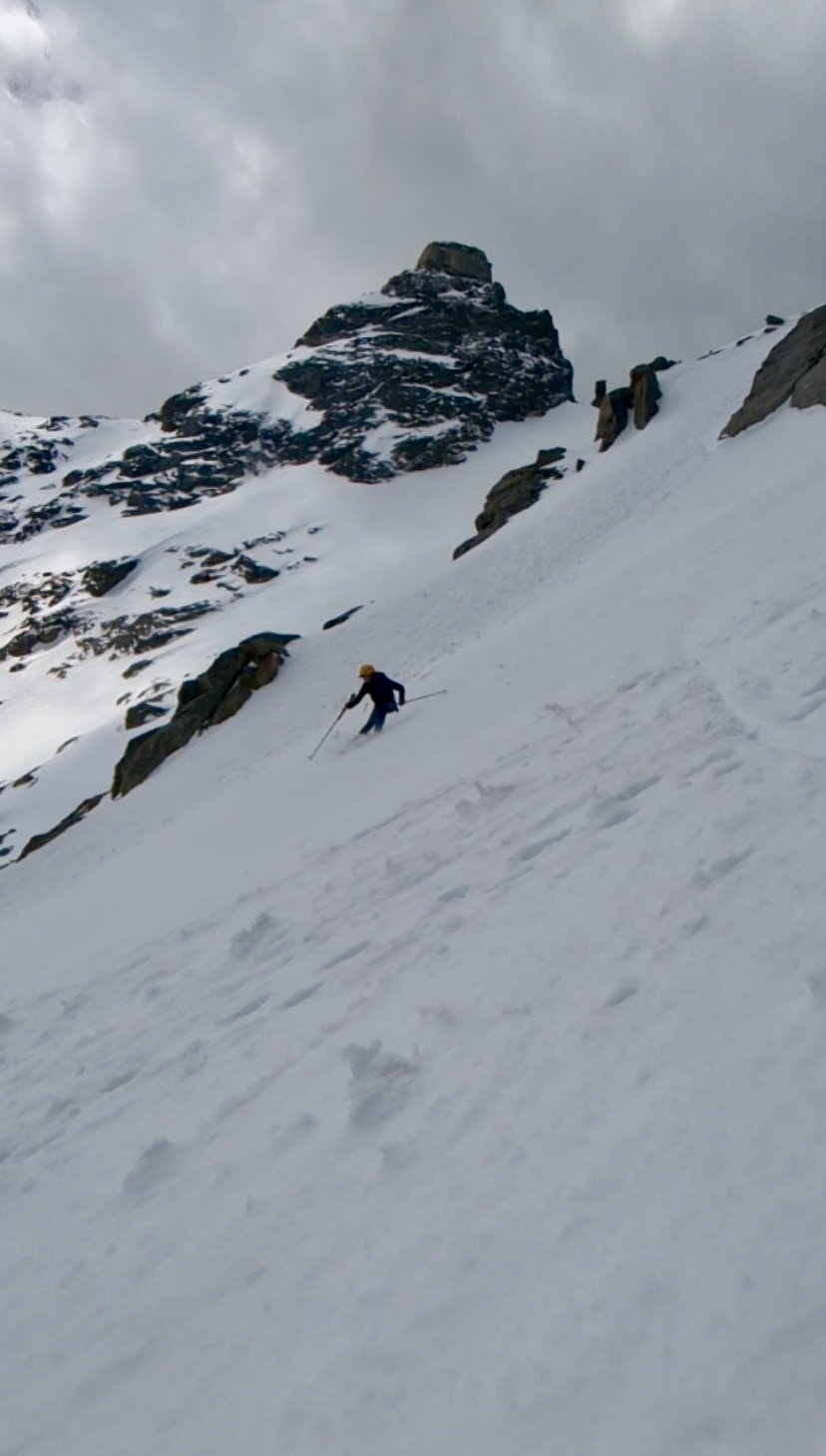  Davide towards the exit of the couloir with Navajo peak and the Navajo snowfield in the backgroun 