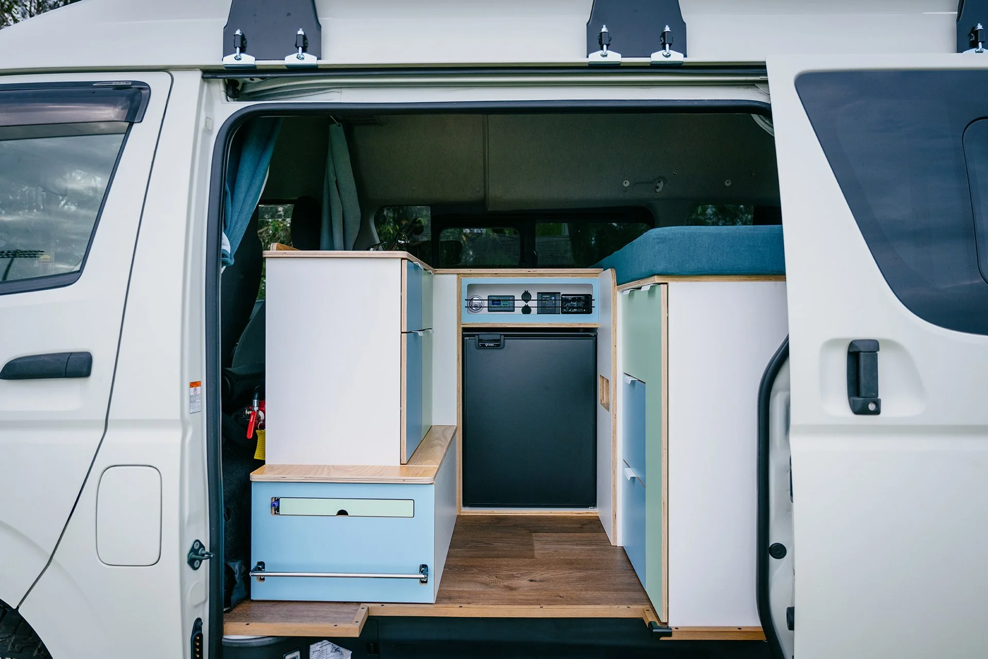 85L Bushman upright fridge in camper kitchen Toyota Hiace van