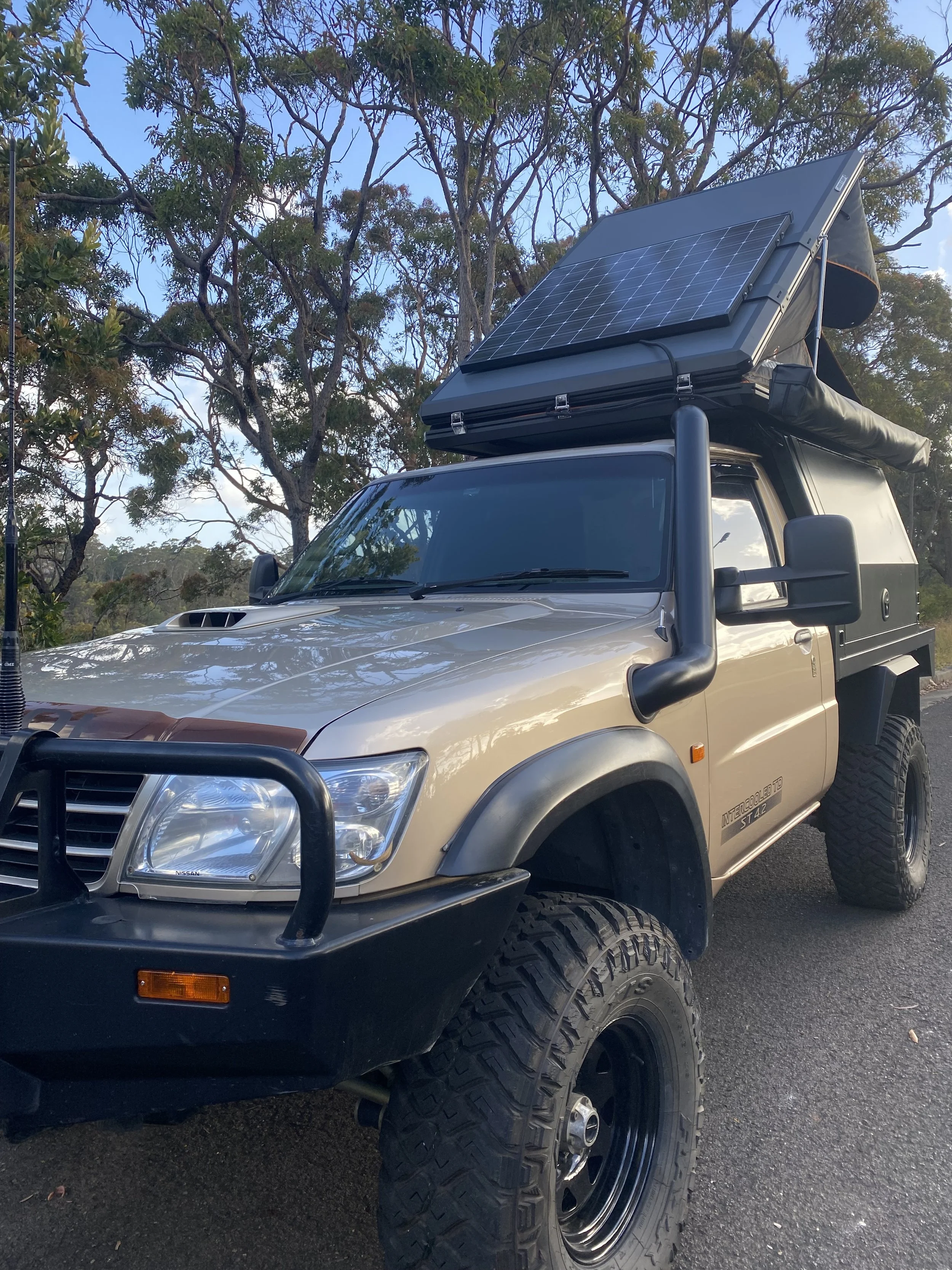 Nissan Patrol canopy camper with roof top tent and dual battery system