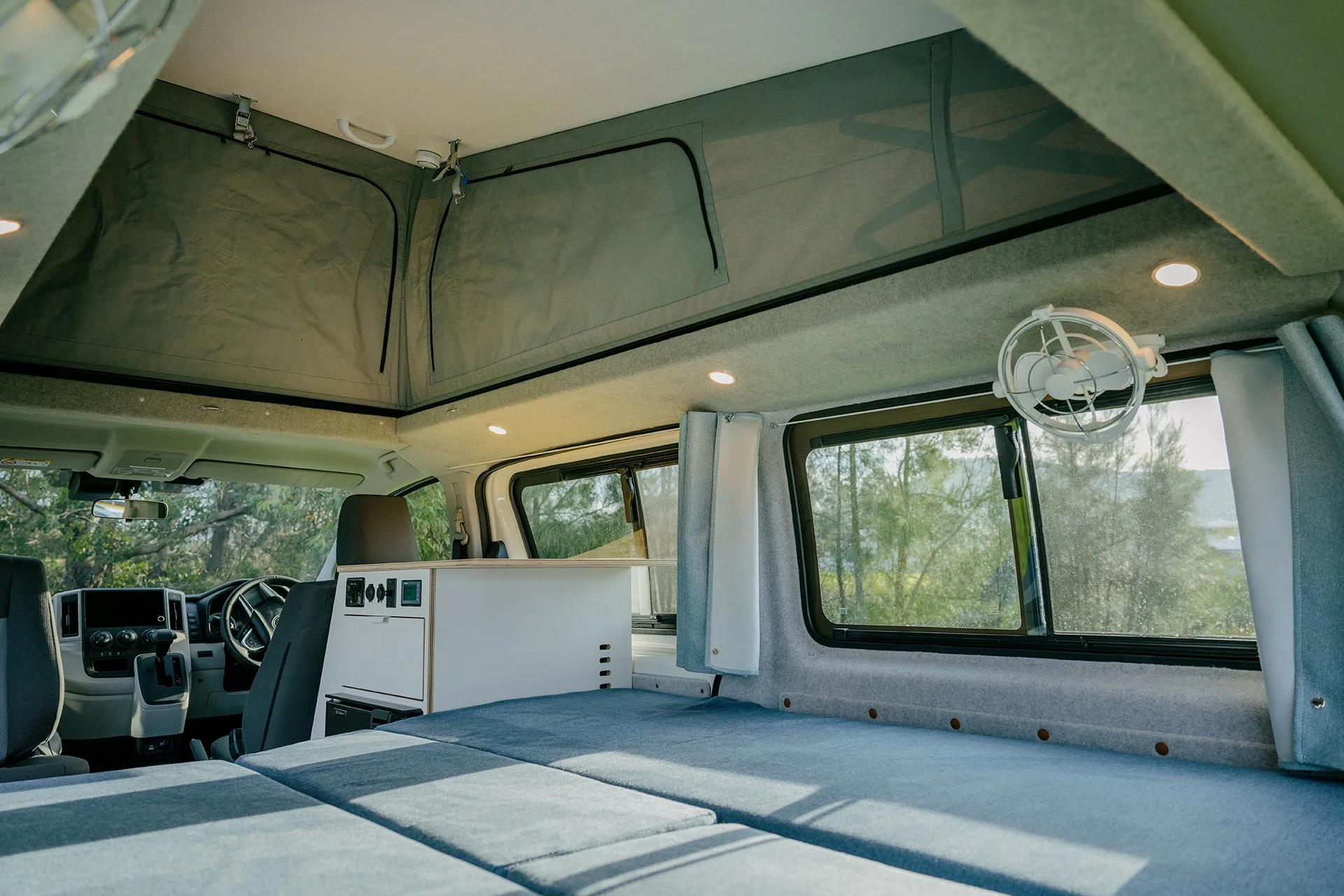 Toyota Hiace pop-top camper conversion with downlights in roof