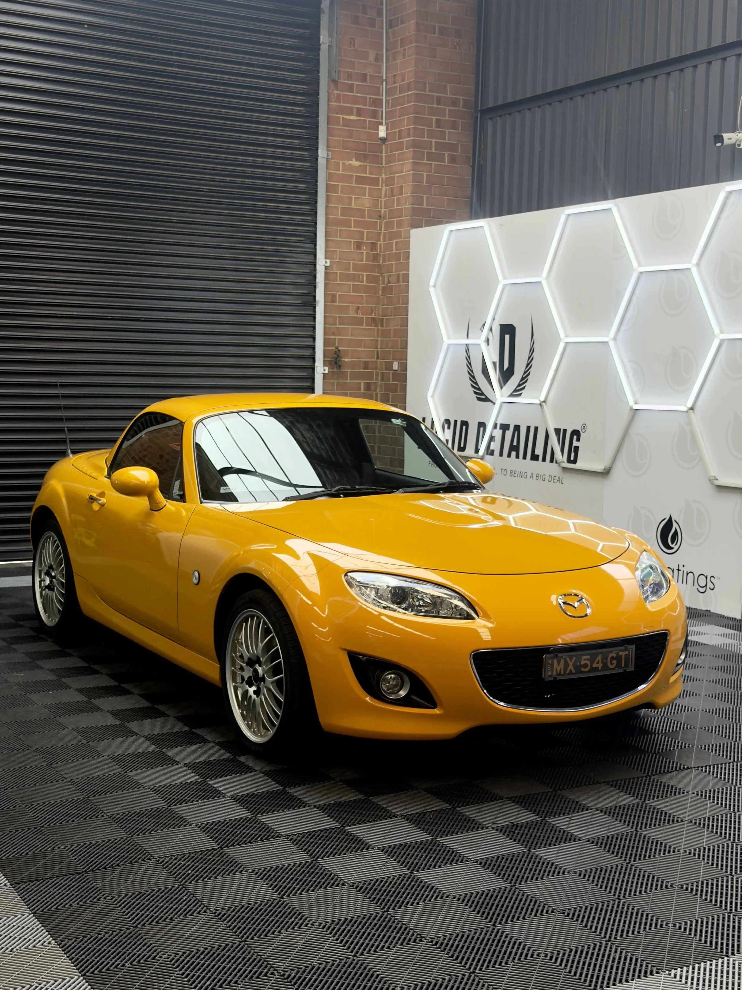 Yellow MX5 in for a ceramic coating and paint correction package. Ceramic coating applied for ease of maintenance on a weekend driven car also adding extra gloss and protection being a colour vehicle