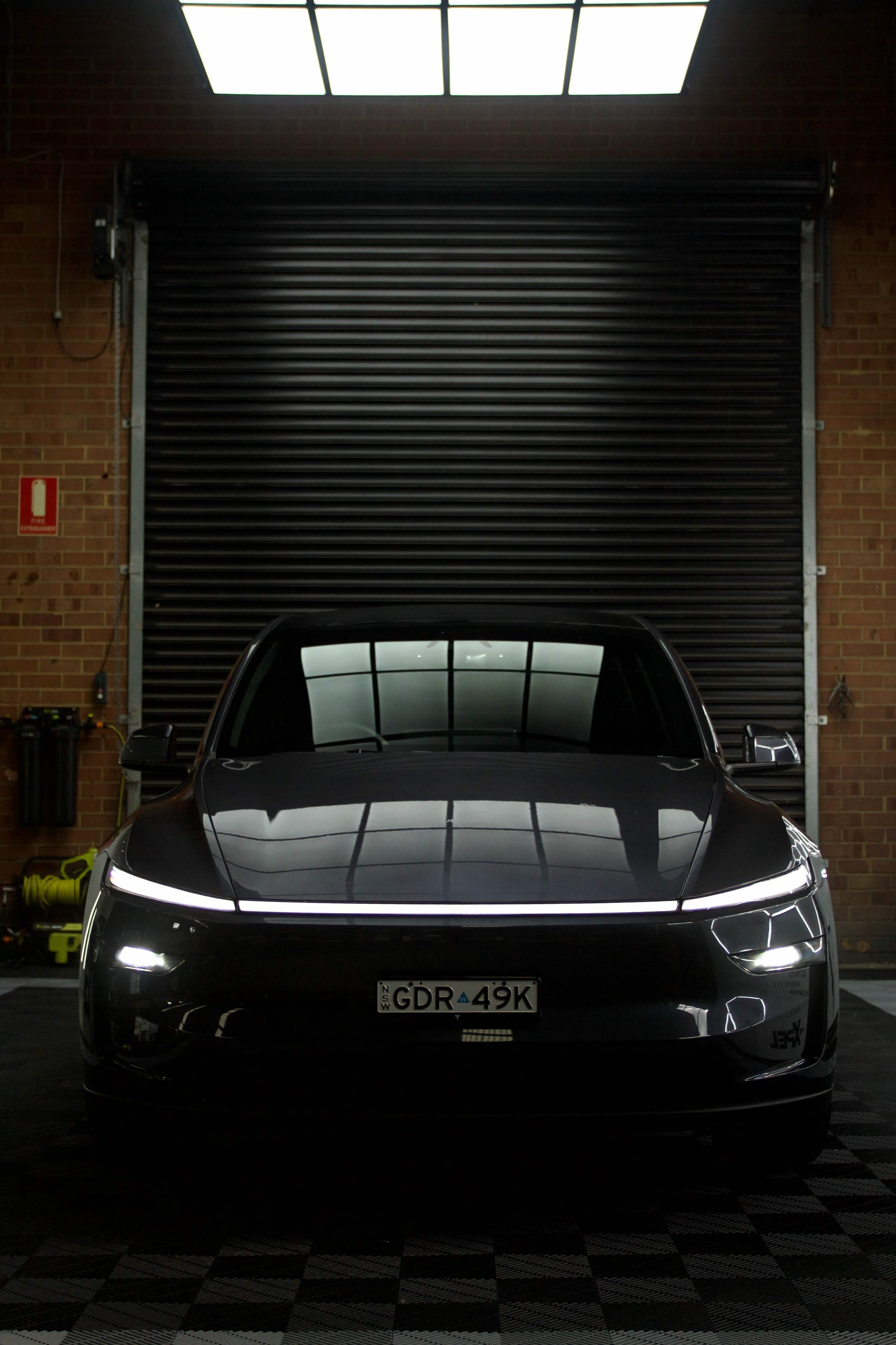 Front on view of a Tesla Y L Coming to Lucid Detailing Penrith for a Full Body PPF and Ceramic Coating
