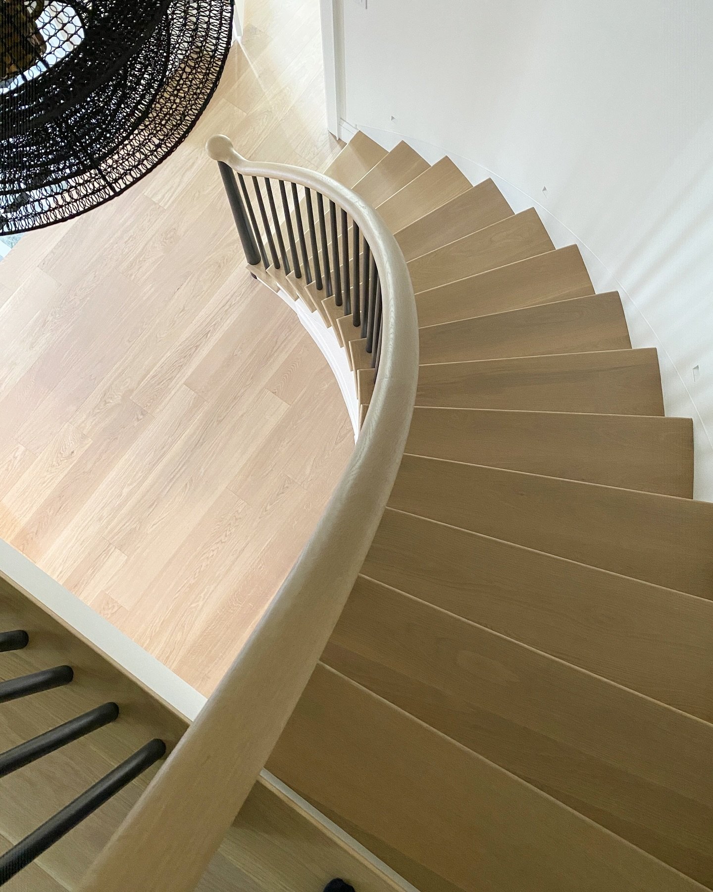 This beauty is waiting for a stair runner to dress her up eventually. She was updated with new white oak treads, new tapered wood spindles and newel posts and white oak rounded railing ❤️