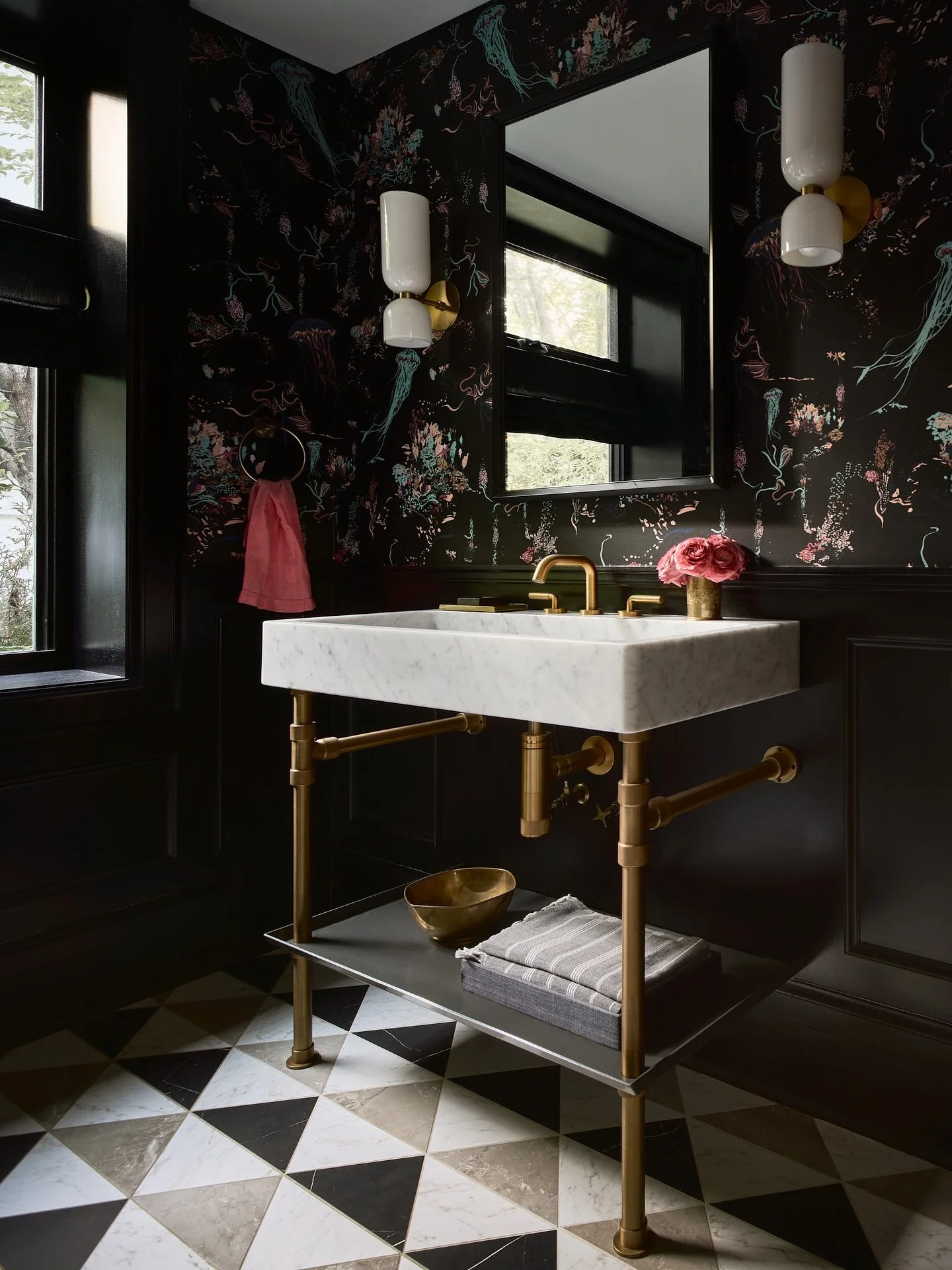 The powder room that started it all! This project started as a kitchen reno, then I casually asked if we should spruce up the powder room too. The answer was yes and then we did the rest of the house 😂. 

This wallpaper was the hardest sale but with