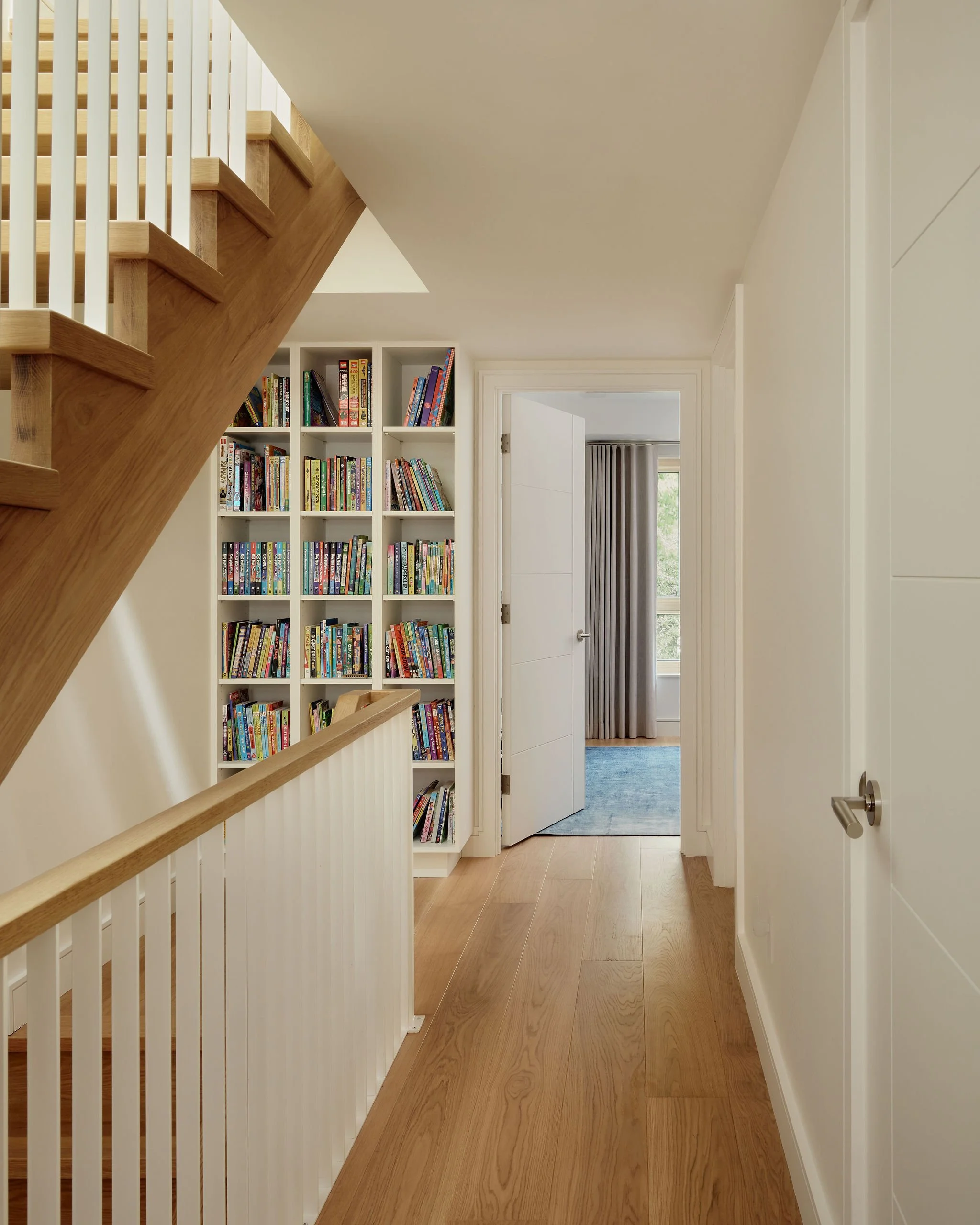 09 prefab-passive-house Space planning stair design white pickets Solid Oak.jpeg