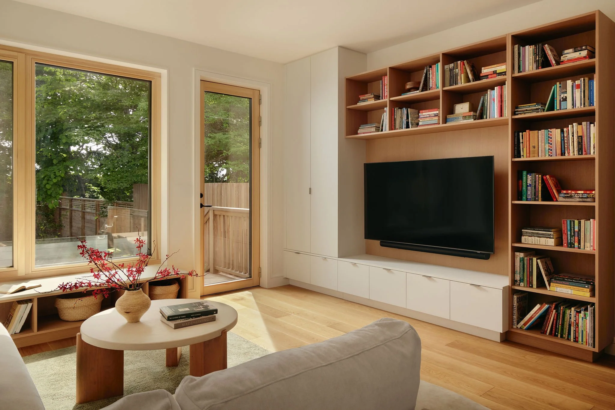 03 prefab-passive-house tv built int bookcase.jpeg