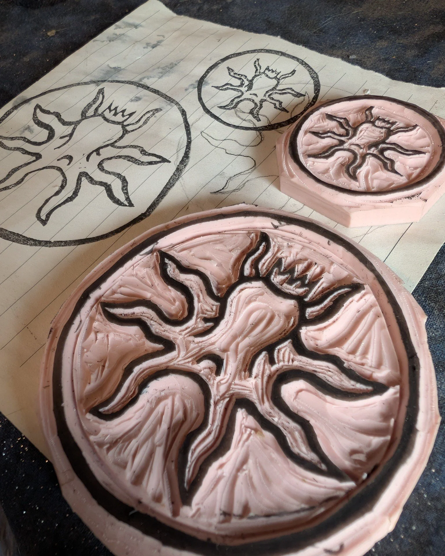I was fortunate enough to be commissioned for these stamps! I drew the design freehand, carved the stamp, and tested until I liked the print quality. They even got a nice little wrap as these are a gift. When I say I work with most materials, I truly