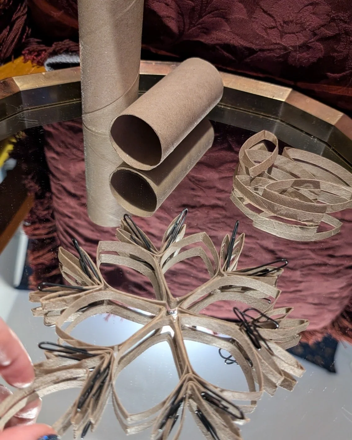 Happy holidays! I am reusing some toilet paper cardboard tubes to make snowflakes this winter, moving my fingers between painting sessions. It's been a long year. I haven't done as much art as I'd like, but I'm coming out of that fog. These snowflake