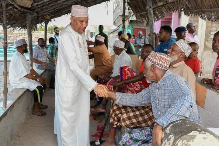 Lamu residents and county officials seated together during a public baraza in Kizingitini, Kenya