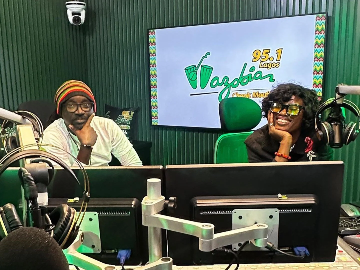 Wazobia FM presenters Ratata and Suo posing together inside the radio station’s studio