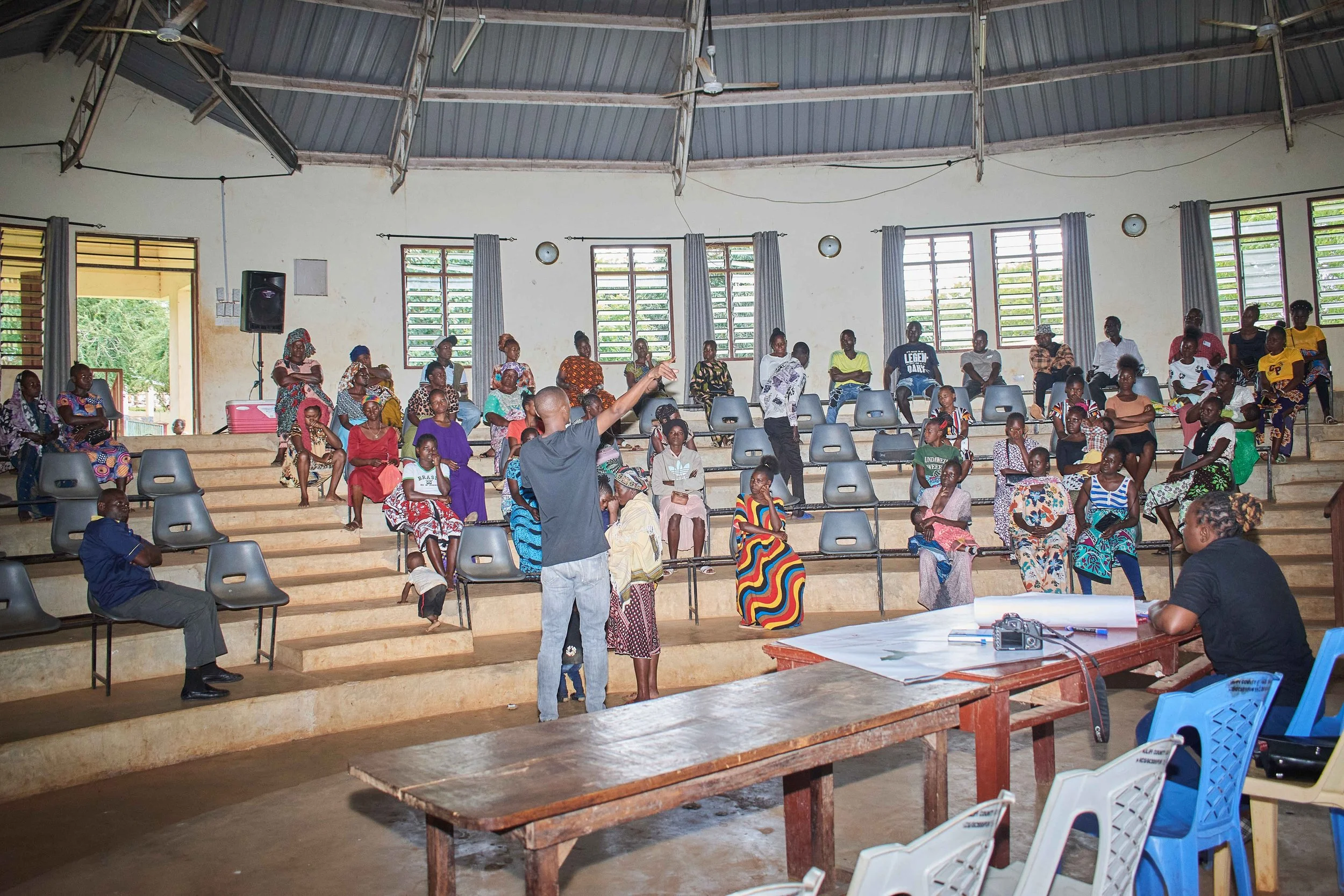 Facilitator addressing residents during a county project accountability baraza in Mwarakaya Ward, Kilifi County
