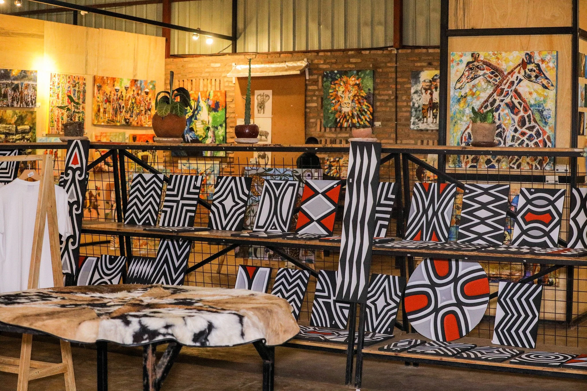 Motif Rwanda Imigongo: The Story Behind Rwanda’s Swirling Cow-Dung Art — NKENNE