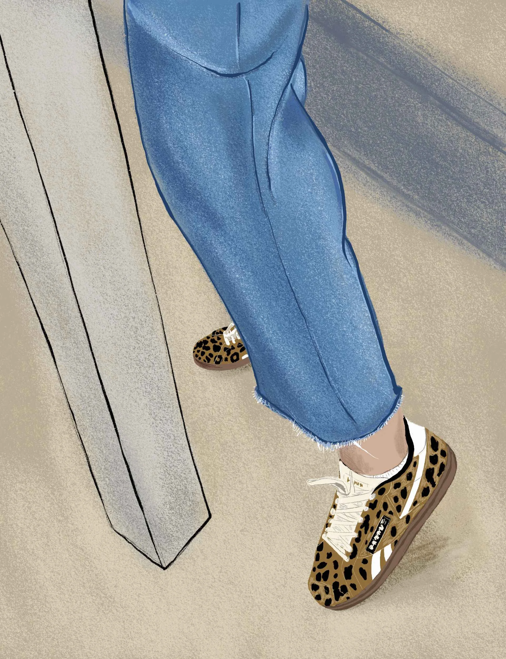 Person wearing blue jeans and leopard print sneakers, standing next to a beige wall or furniture.