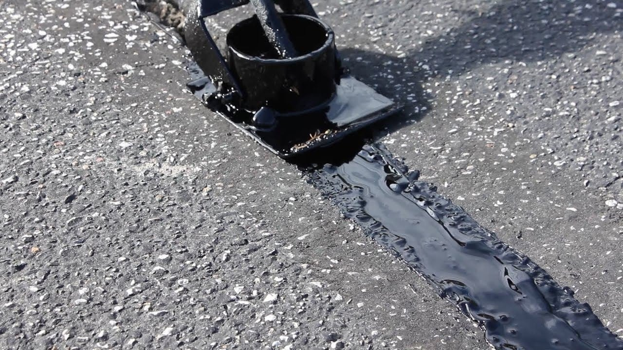 CONCRETE PAVEMENT CRACK REPAIR