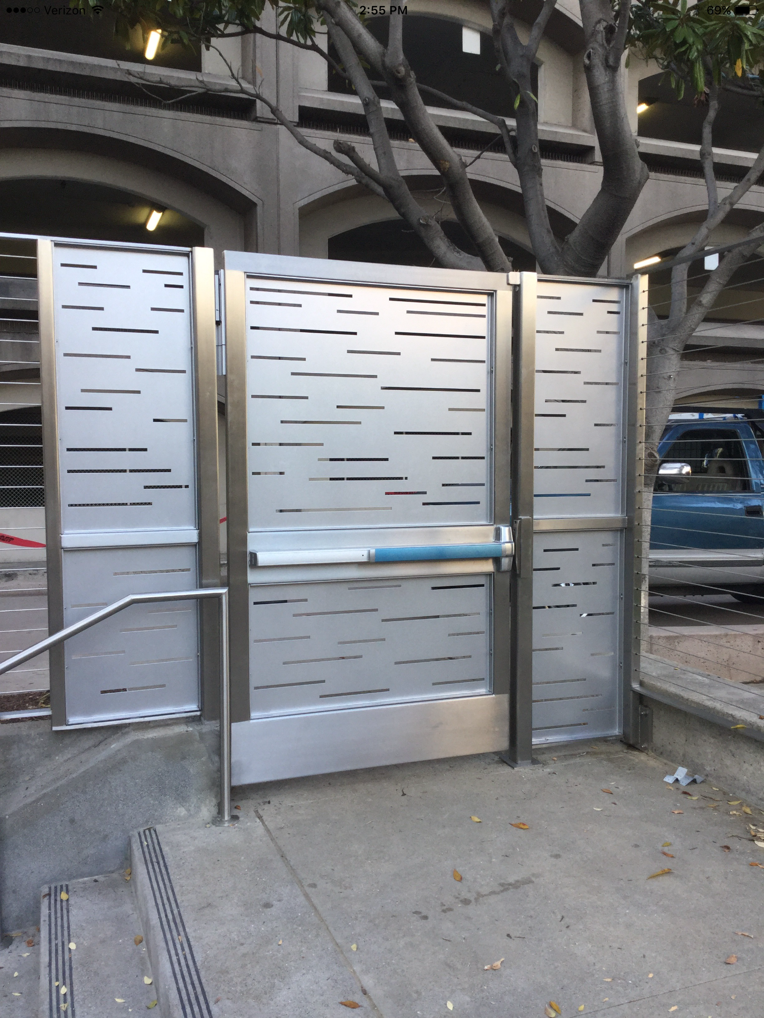 Stainless Steel Fence and Gates with Panic Hardware and Aluminum Laser Cut Infill Panels