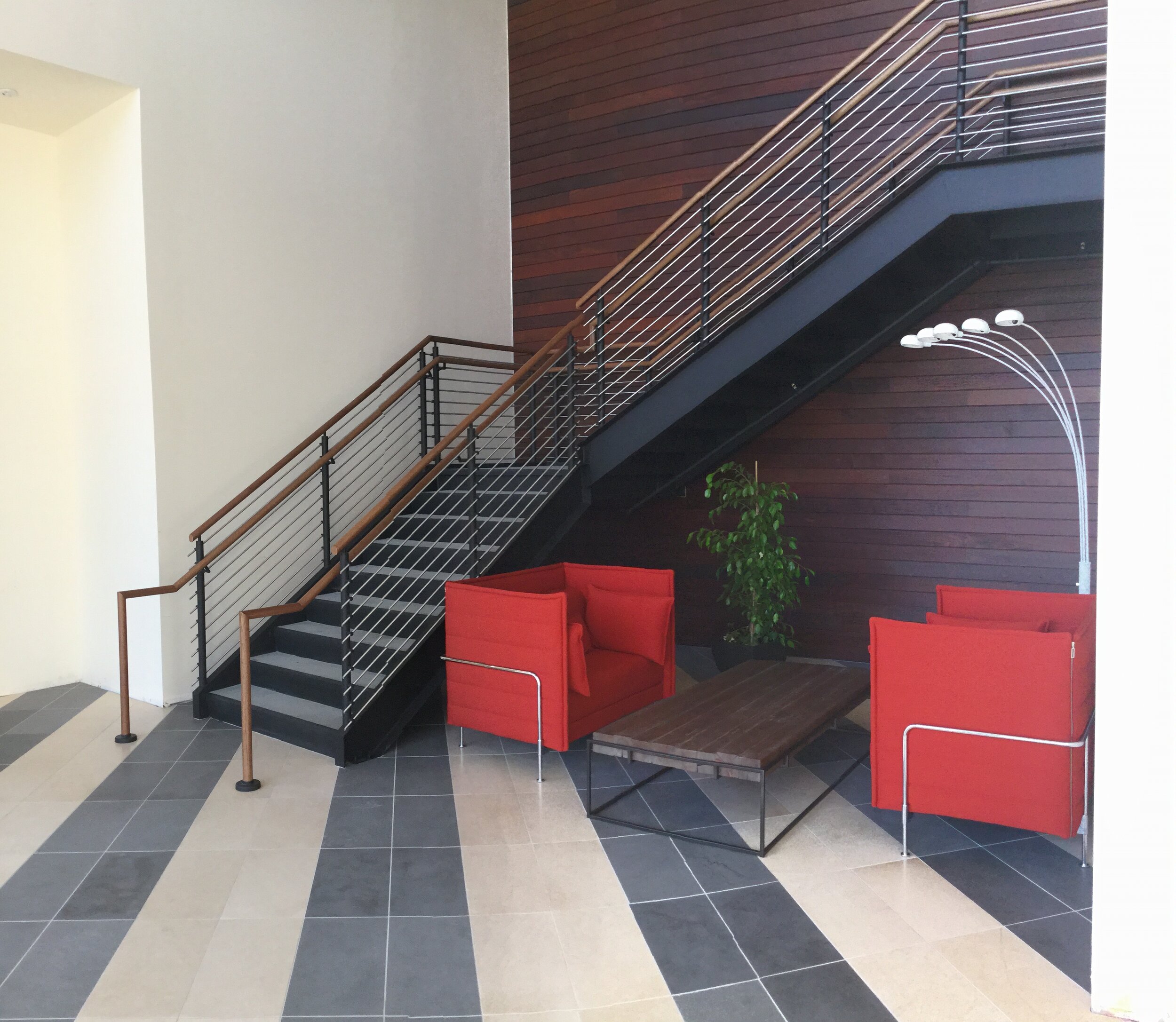 Stainless Steel Railing with Blackened Traverse Rod Infill and Hardwood Cap