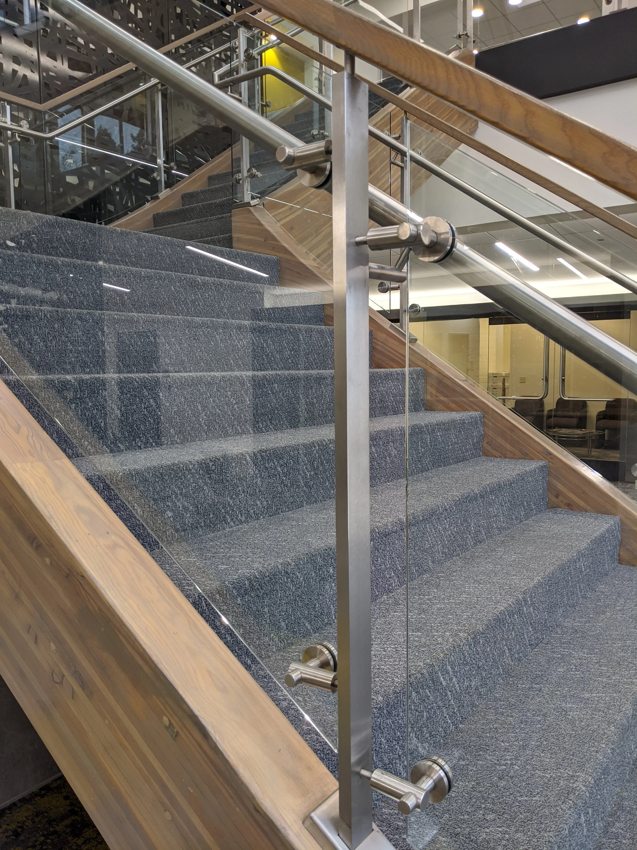 Glass Guardrails with Custom Stainless Steel Posts, CRL Stainless Steel Brackets with Stainless Steel Handrail and Wood Cap Rail