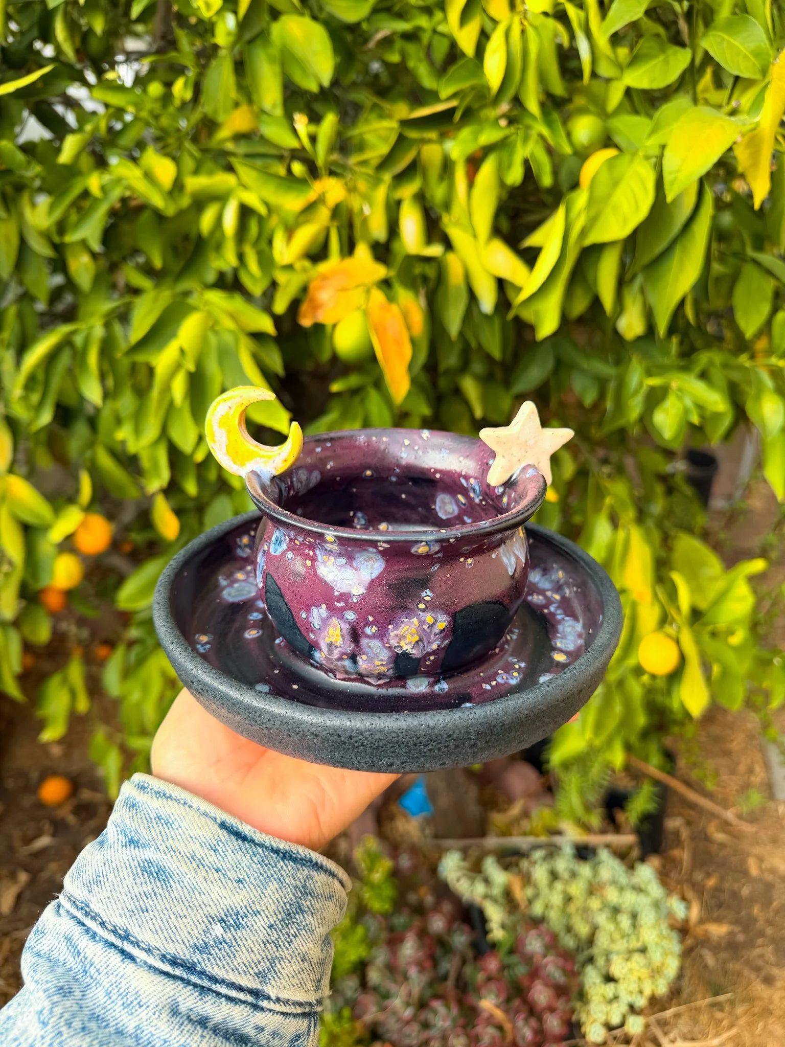 Potion D (cauldron, crescent, star)