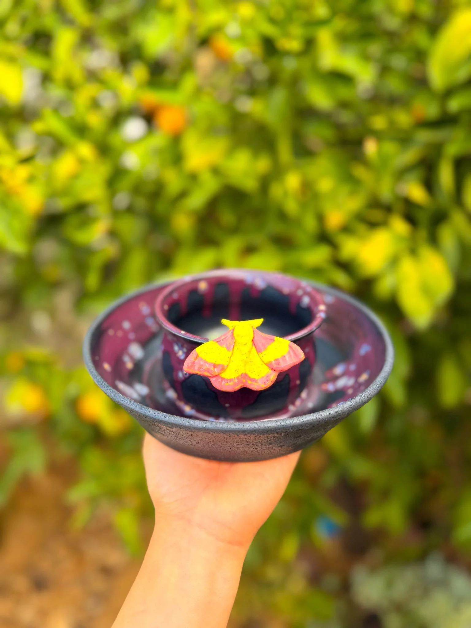 Potion F (cauldron, rosy maple moth)