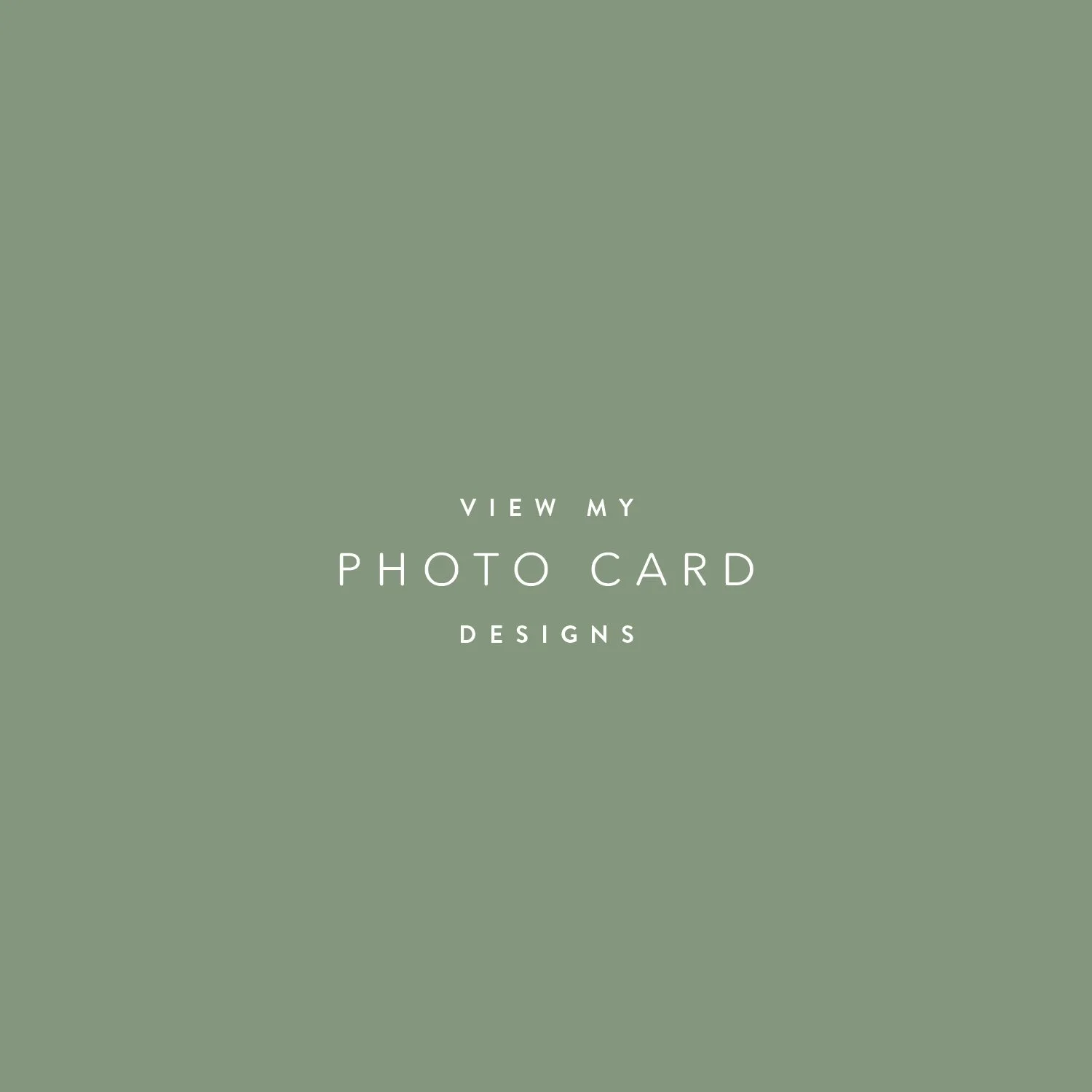 A promotional graphic with green background and white text that says "View my photo card designs."