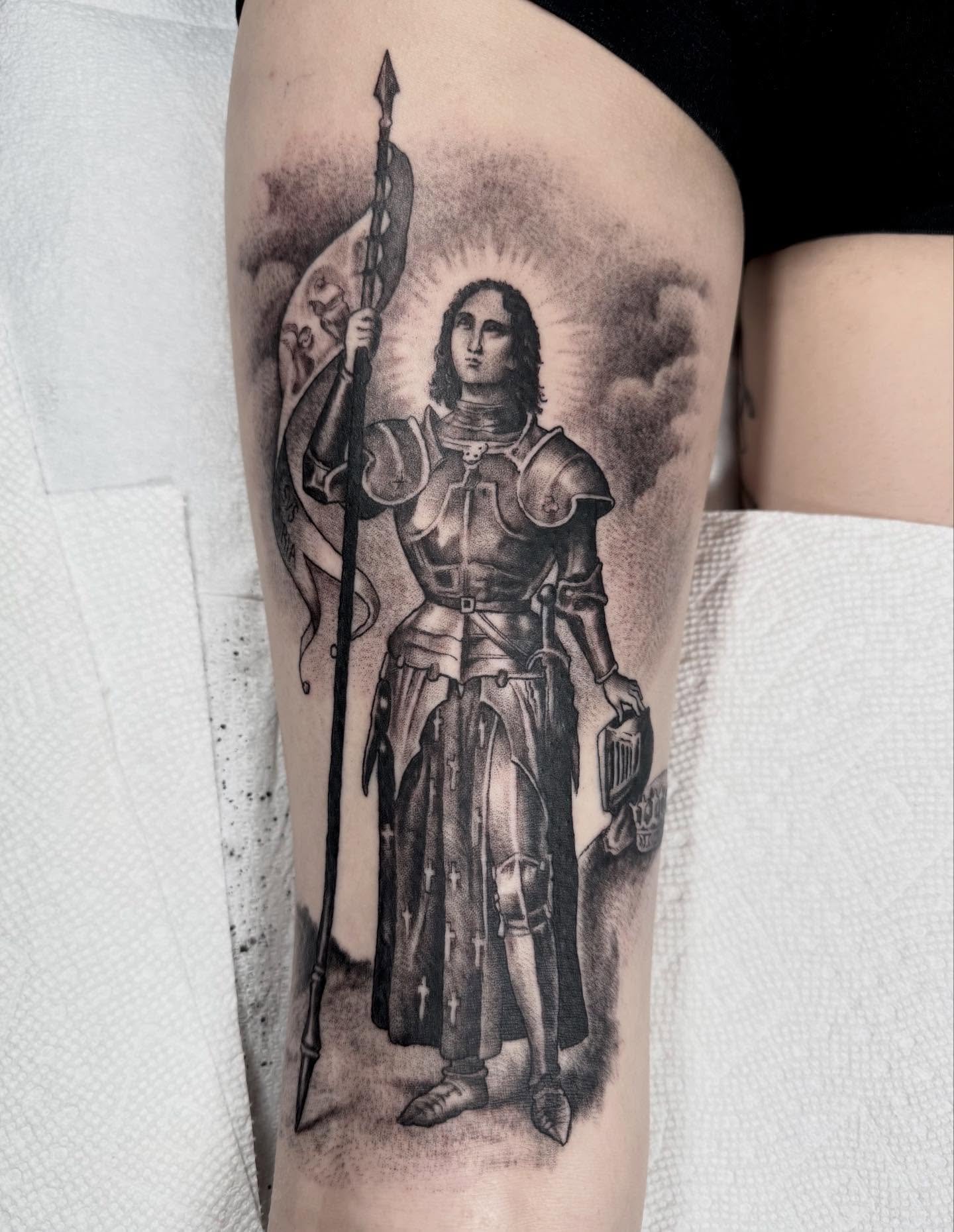 Joan of Arc on back of thigh