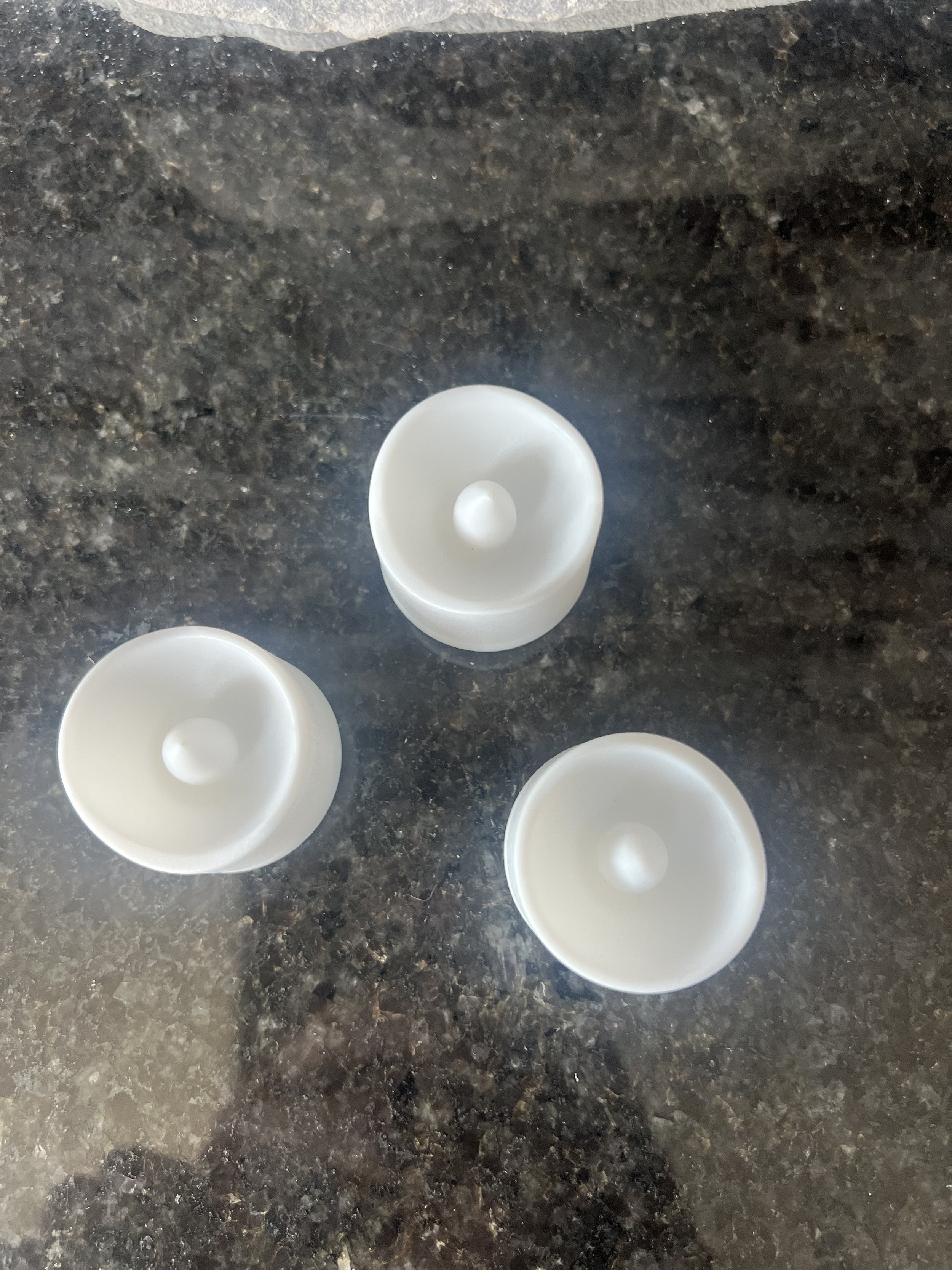 white votive tea lights.jpeg