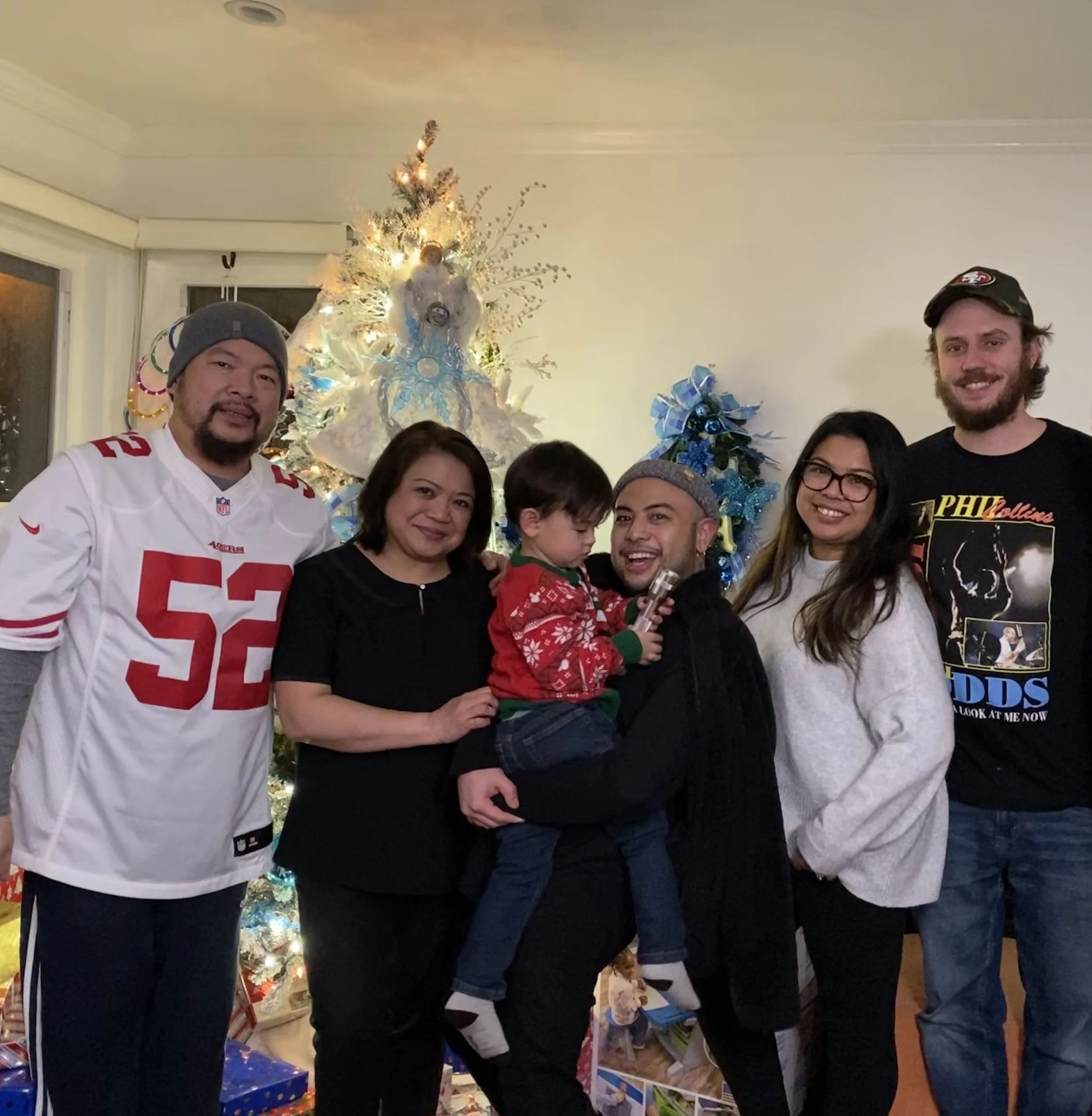 eman with parents, sister, brother in law and godson.JPEG